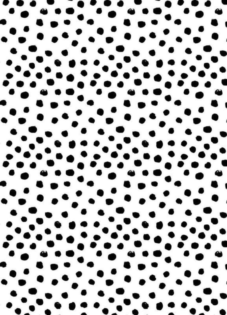 Black And White Dots 桌布 壁紙 — 極簡風格牆紙，在純白背景上散落黑色墨點，形成大膽的圖案。