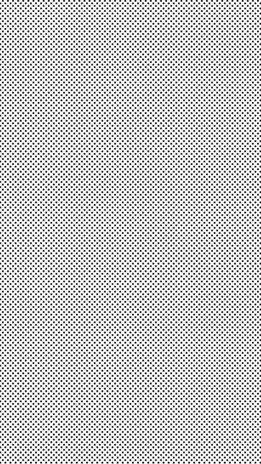 Black And White Dots 桌布 壁紙 — 極簡風格牆紙，白色背景上均勻分佈黑色圓點，營造出微妙的半色調紋理。