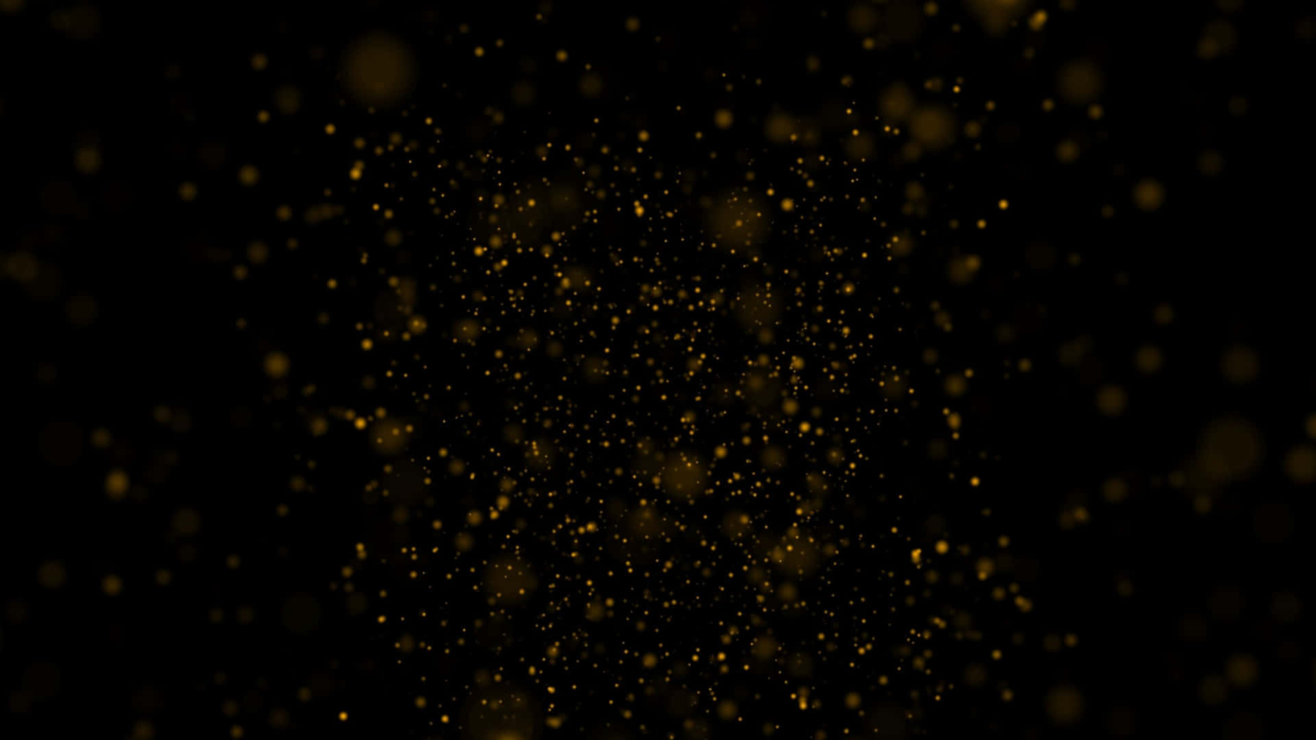 黑色背景上漂浮的金色閃光，營造出神奇的發光效果。