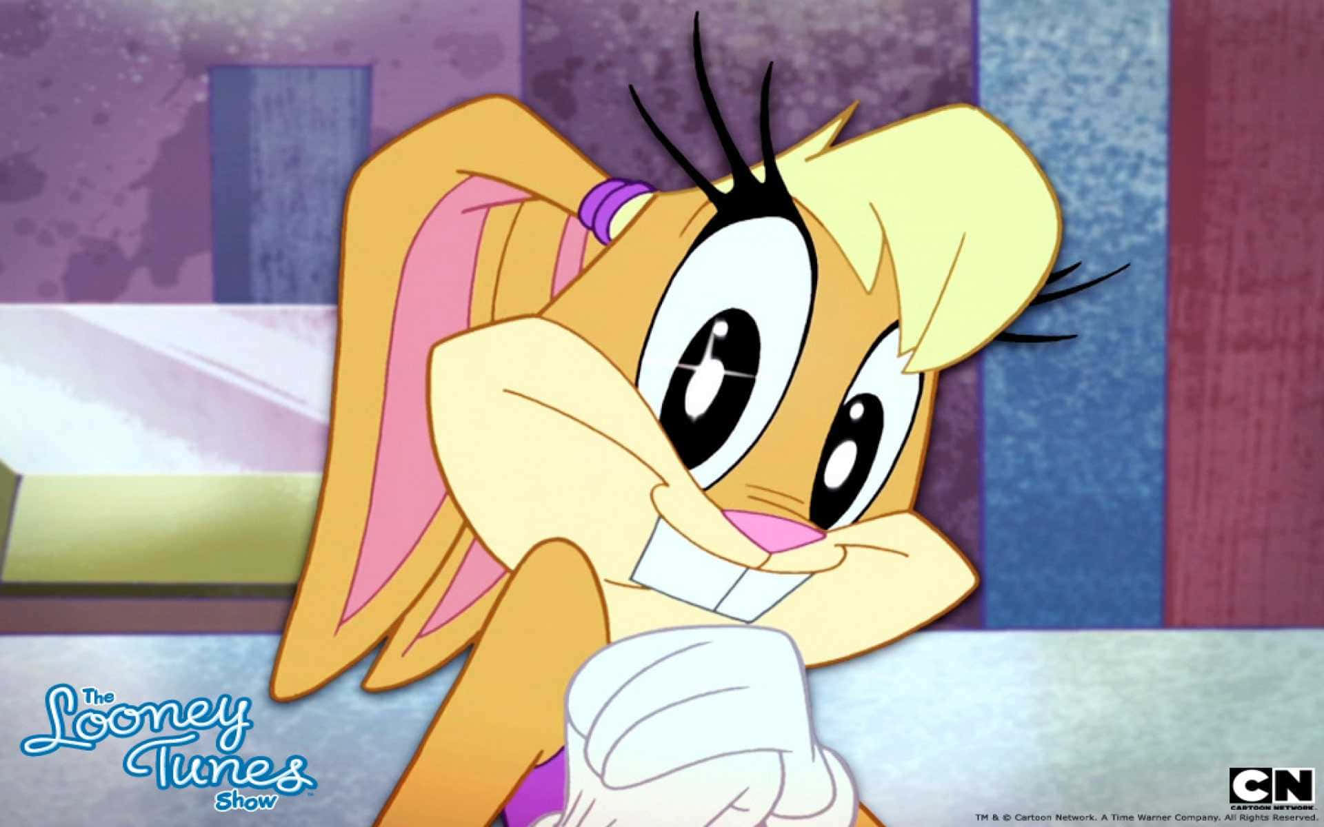 樂一通動態壁紙 壁紙 — Looney Tunes 嘅 Babs Bunny 喺色彩繽紛嘅抽象背景前，用手托住下巴，開心地笑。