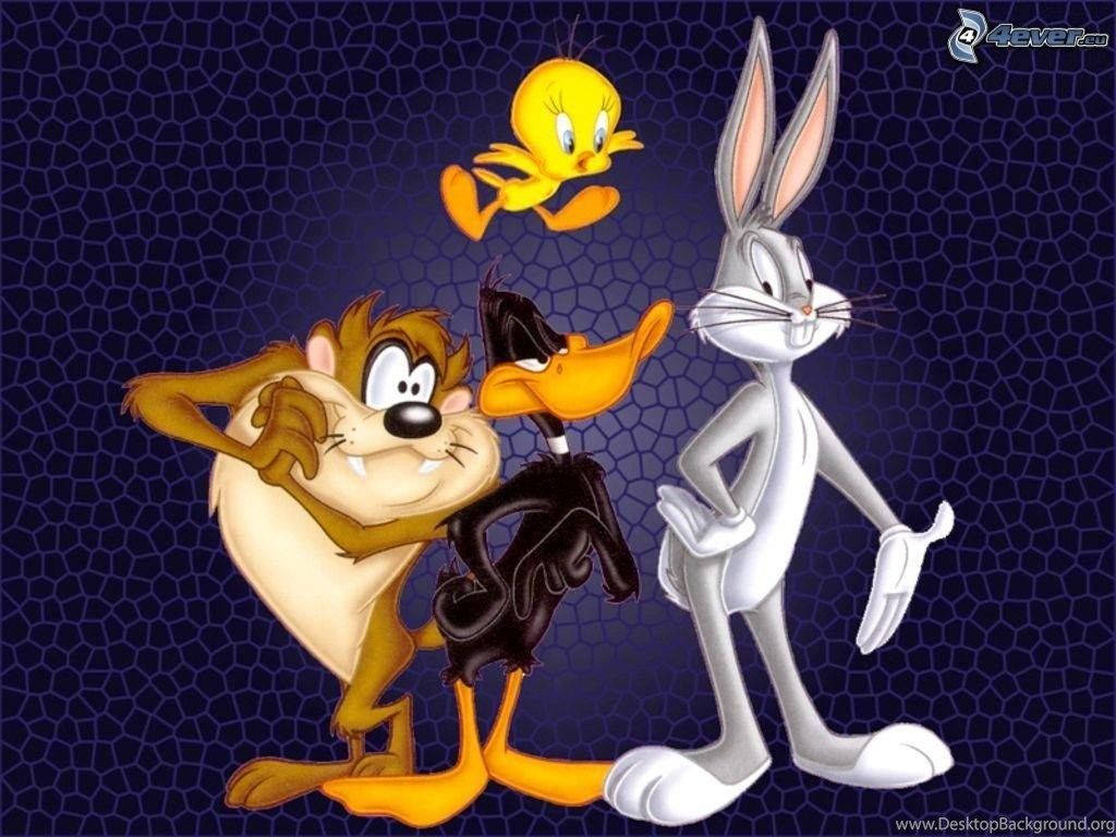 經典 Looney Tunes 角色 Taz、Daffy Duck 和 Bugs Bunny，Tweety Bird 在上方飛翔。