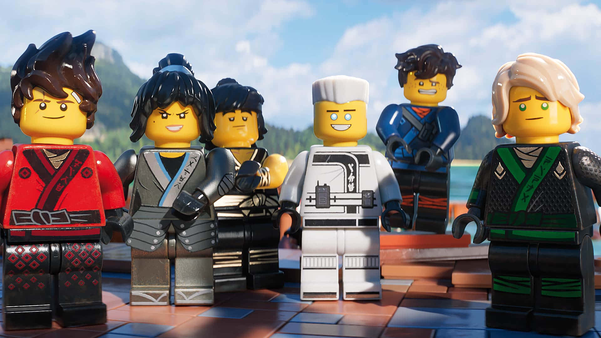 六個LEGO Ninjago角色站在木甲板上，背景有山脈和水。