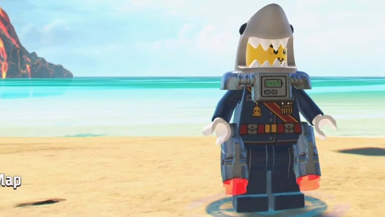 LEGO鯊魚迷你人偶在沙灘上，背景有海洋和火山懸崖