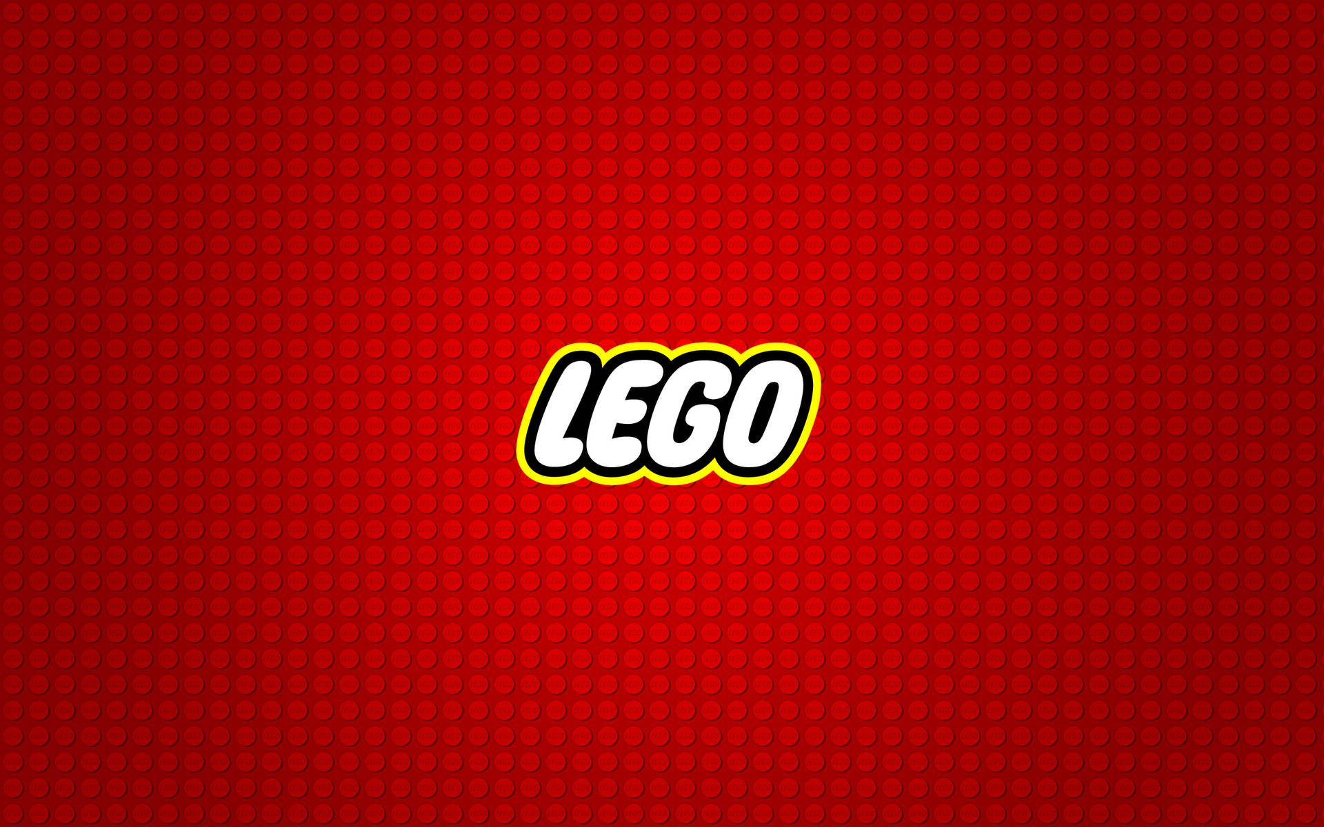 紅色磚紋背景，中央為白色、黃色和黑色的LEGO標誌。 — 樂高 GIF 壁紙