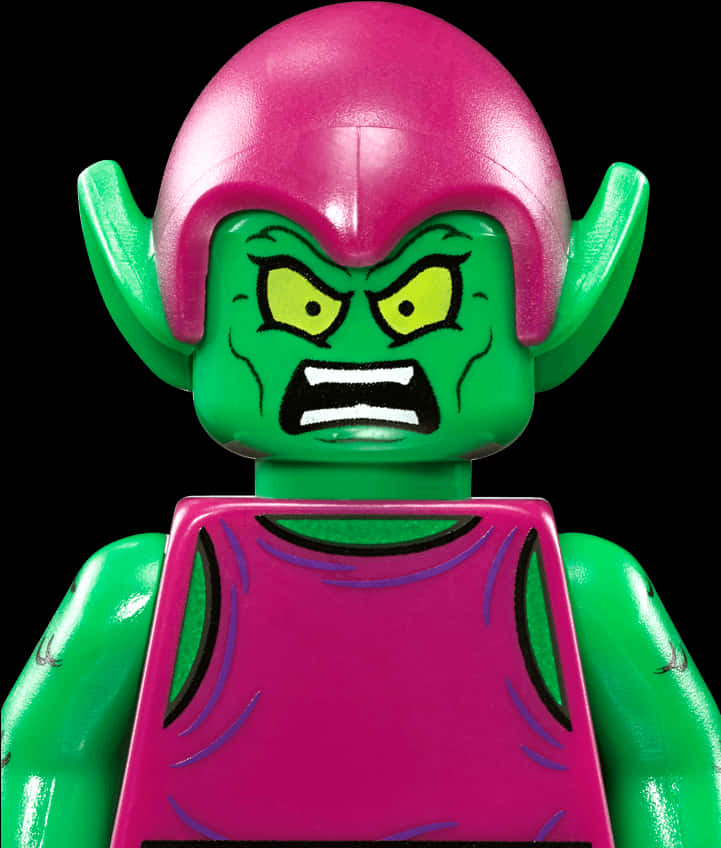 樂高綠惡魔特寫 壁紙 — 黑色背景上，一個綠色LEGO迷你人偶，粉紅色頭髮，憤怒表情的特寫。