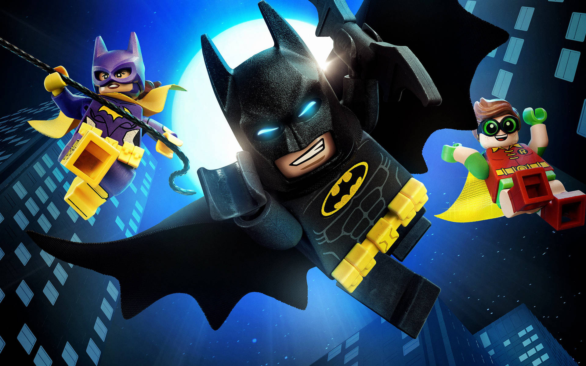 LEGO Batman Batgirl 和 Robin 在夜間飛越城市