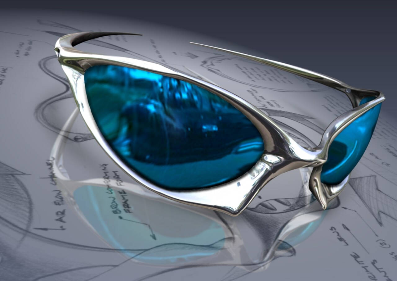 標題：以Oakley賽車夾克運動太陽眼鏡展現卓越表現 壁紙 — 未來感十足的銀色太陽眼鏡，搭配鮮豔的藍色鏡片，放置在詳細的技術圖紙表面上。