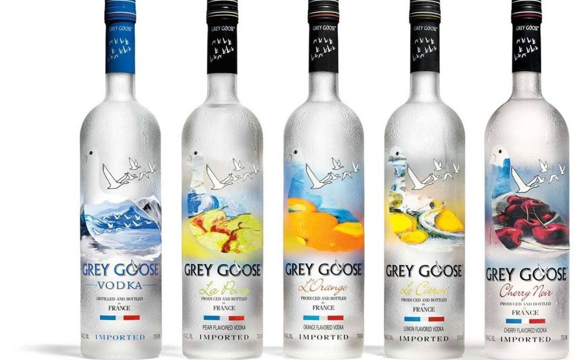 五個Grey Goose伏特加酒瓶，展示不同口味和結霜的玻璃。