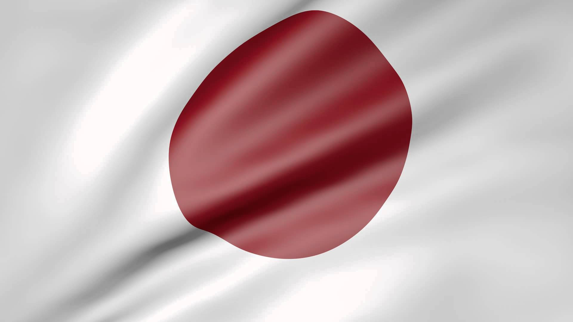 標題：飄揚榮光——壯麗日本國旗 壁紙 — 一面飄揚的日本國旗，白色布料中央有一個深紅色圓圈，捕捉柔和光線。