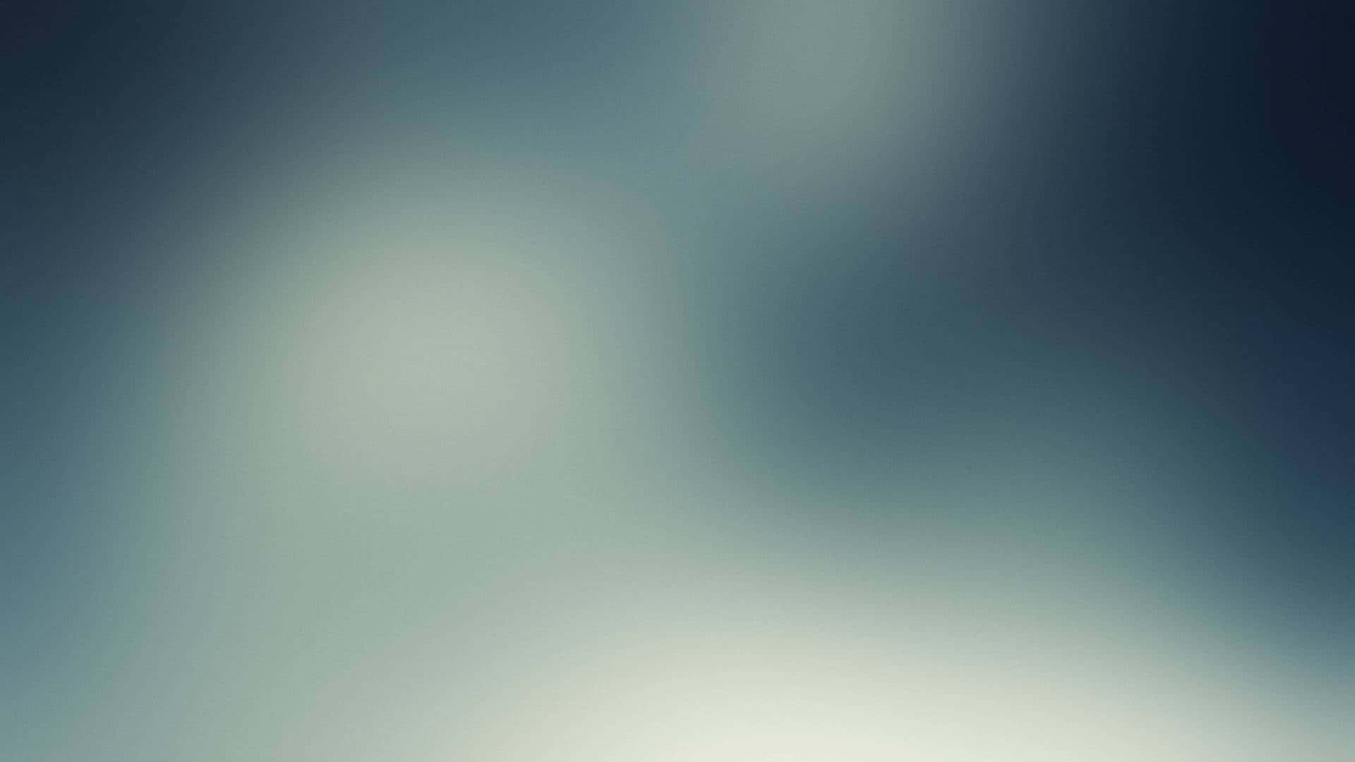 柔和藍白漸變抽象背景，帶有模糊光效。
