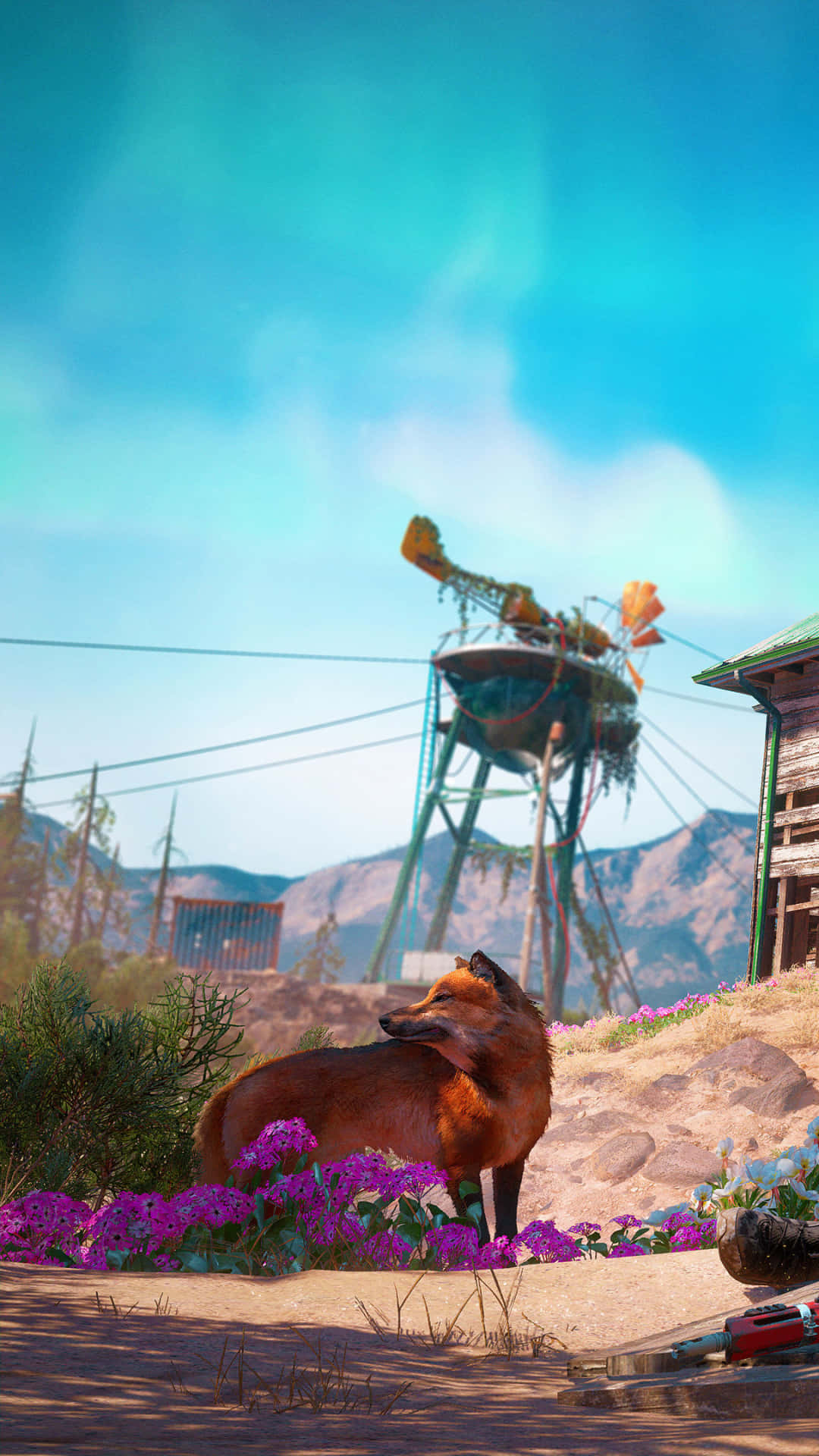 橘色狐狸背景：Far Cry New Dawn Pixel 3 壁紙 — 一隻紅狐在陽光普照的沙漠景觀中，在紫色花朵間警覺地站立，背景有生鏽的水塔和山脈。