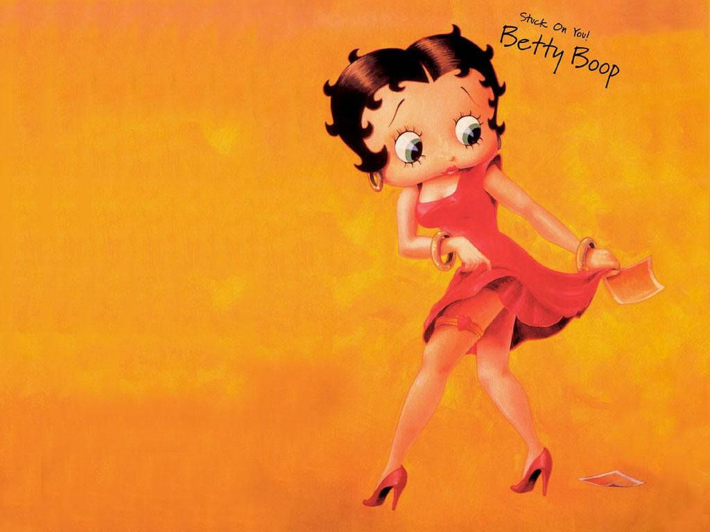 Betty Boop 身穿紅色連衣裙和高跟鞋在橙色背景上跳舞。