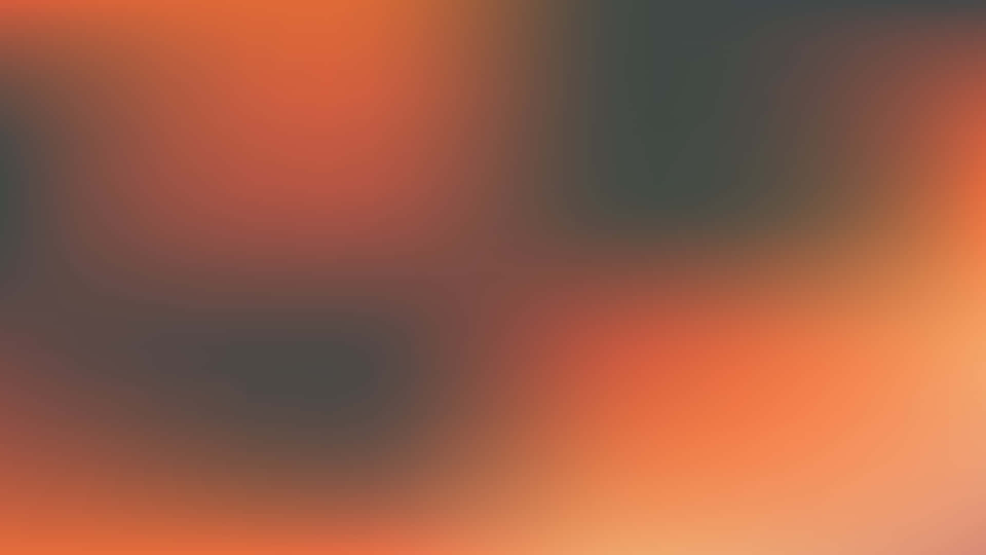 帶有橙色和灰色調的抽象漸變背景。