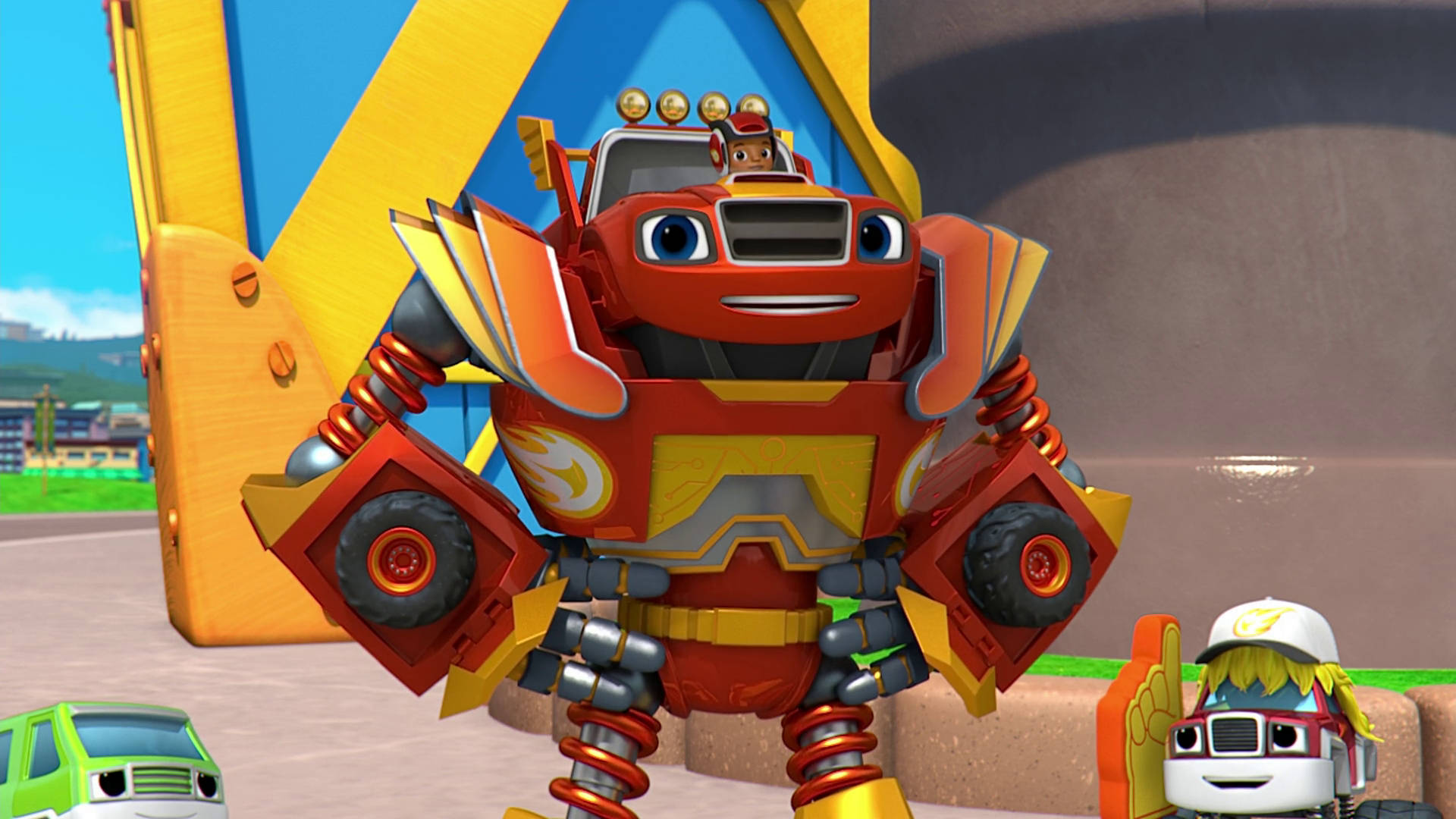 機械化Blaze And The Monster Machines 壁紙 — 一個帶有黃色點綴和彈簧臂的快樂紅色機械人，驕傲地站在明亮的戶外環境中。