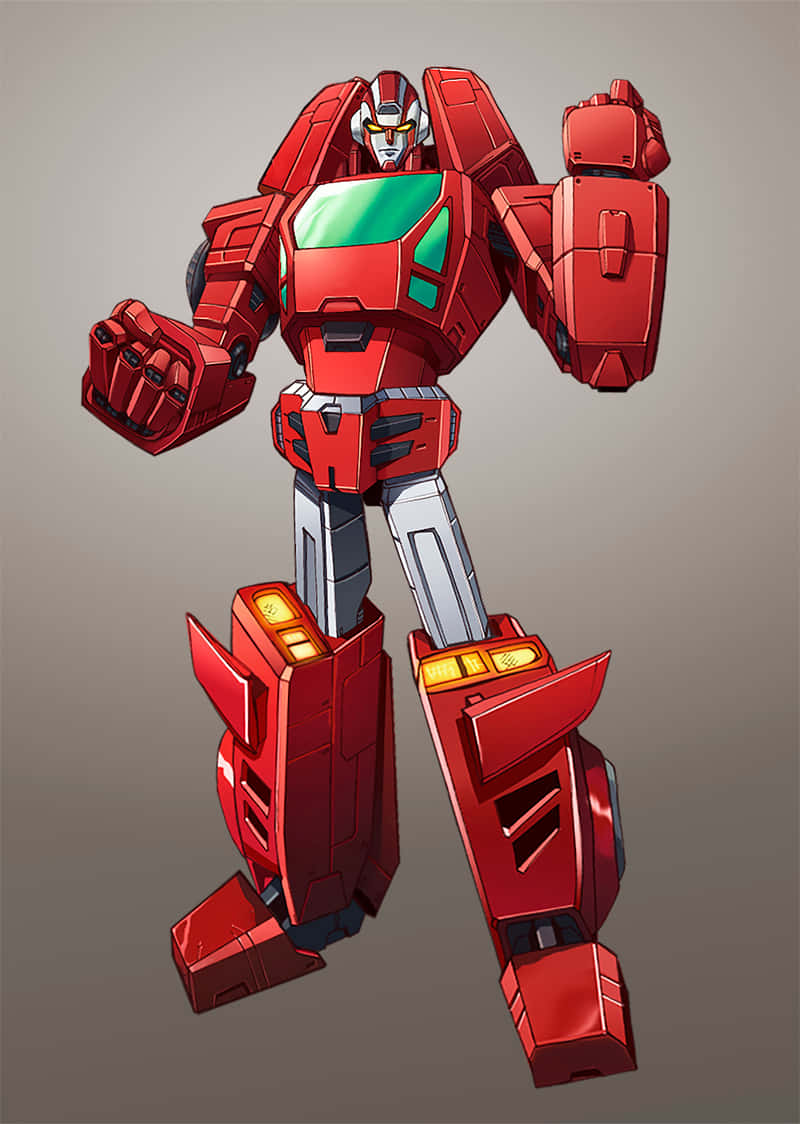 《機械戰士》中的紅色機器人 壁紙 — 一個高大的紅色機械人，帶有綠色胸部面板和銀色雙腿，以動態姿勢站在中性灰色背景前。