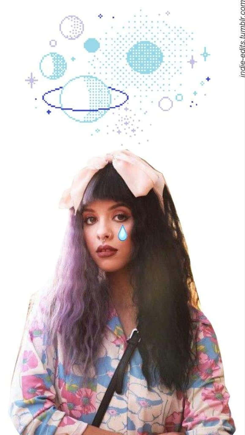 紫髮年輕女性與淚滴表情符號，被漂浮的行星和星星環繞。