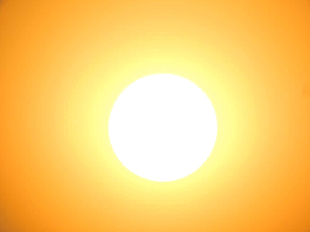 一顆明亮的太陽在橙色天空中散發溫暖。