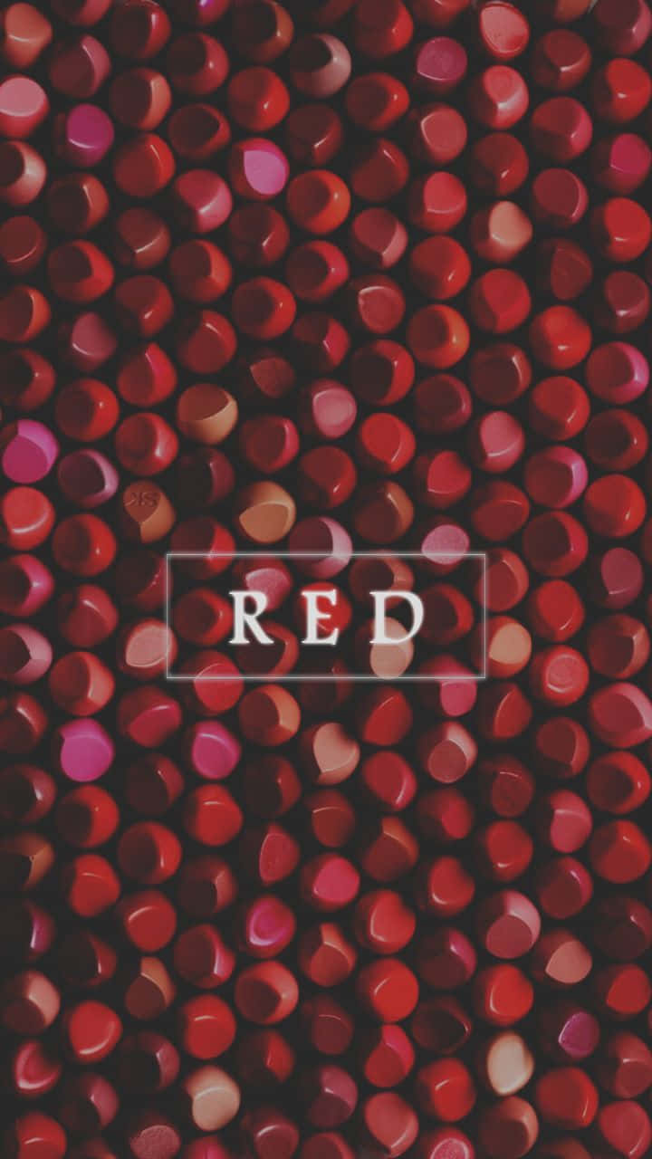 光面紅色同粉紅色珠子嘅特寫，中間有 RED 字樣。