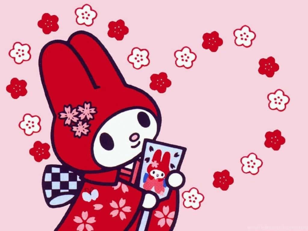 歡樂可愛 — My Melody 壁紙 — 一個穿著紅色衣服的可愛My Melody角色手持照片，被紅色和白色的櫻花包圍在粉紅色背景上。