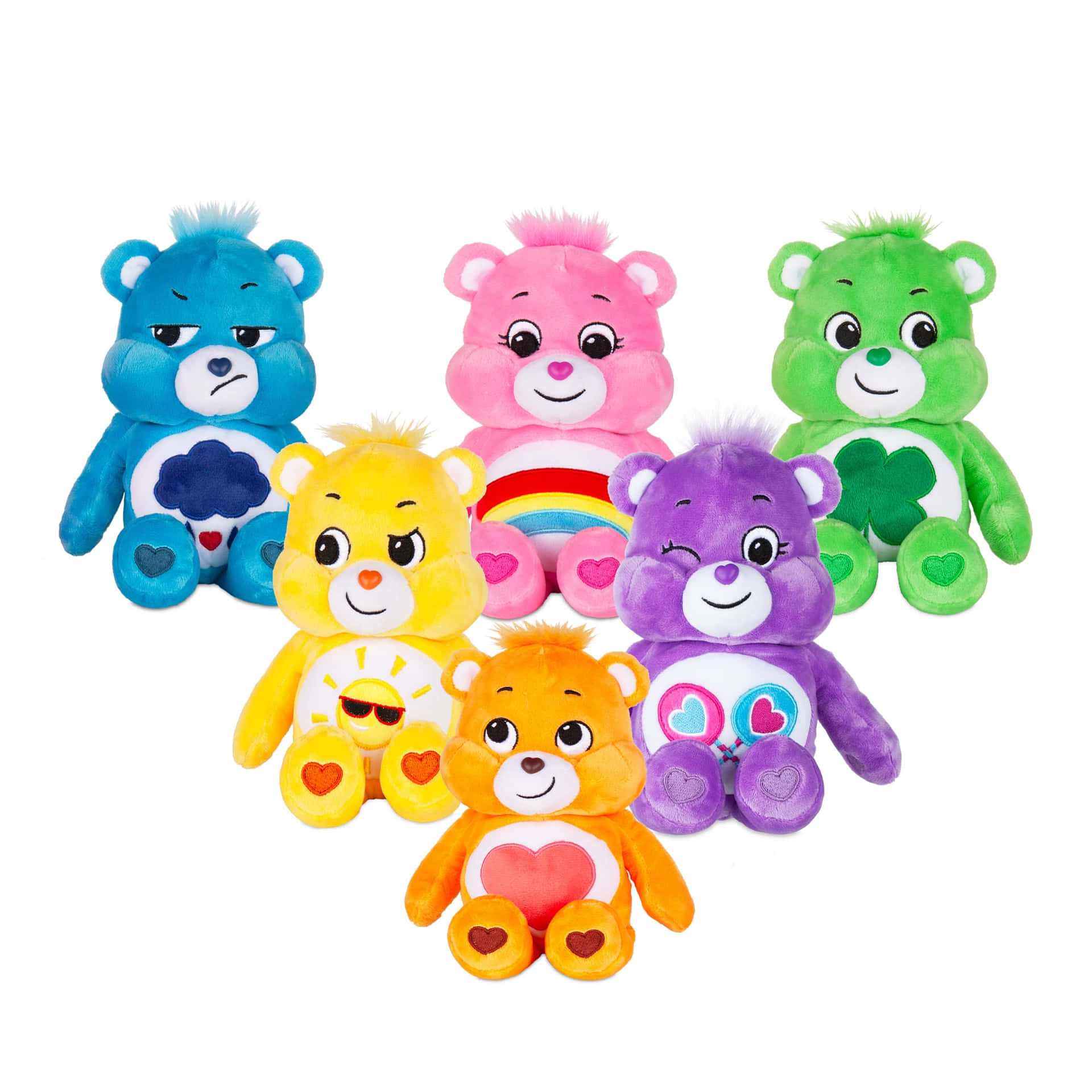 六個色彩繽紛的 Care Bears 毛絨玩具，帶有獨特的標誌和表情。