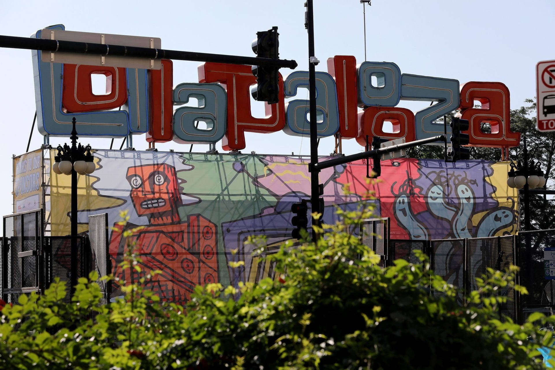Lollapalooza節日標誌，帶有卡通人物和交通燈。