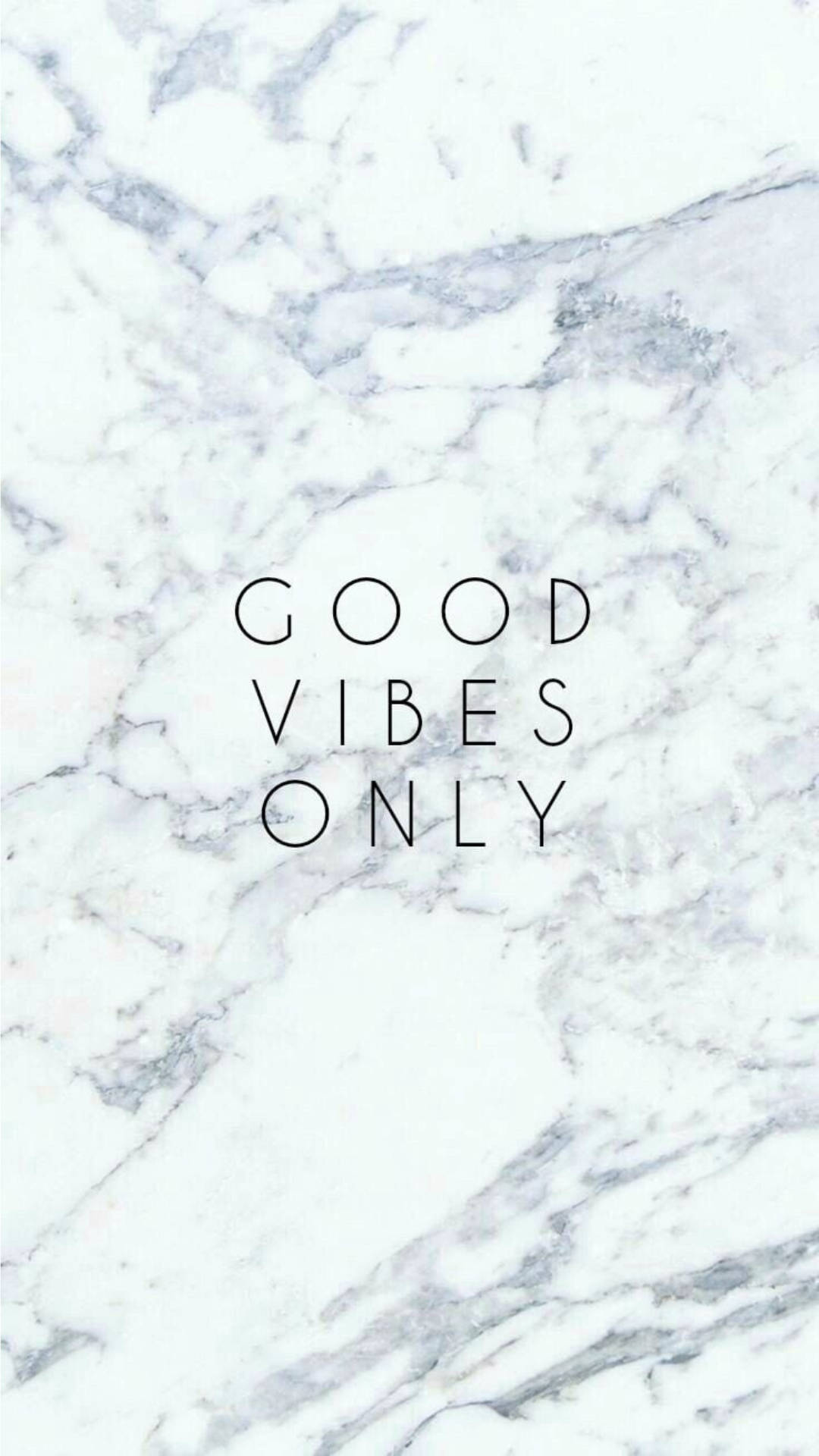 大理石紋理，黑色字母寫著 good vibes only 這句話。