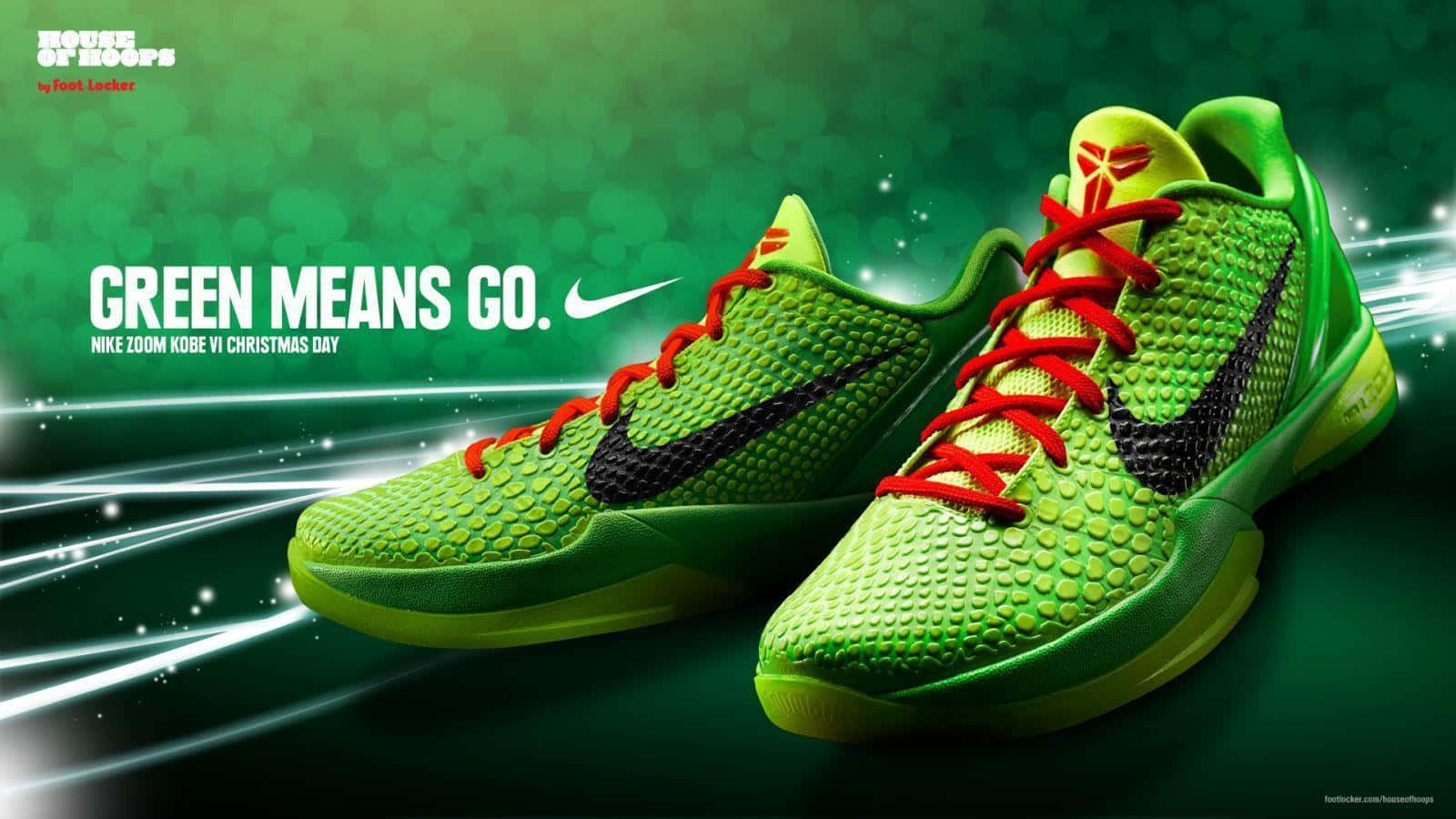 綠色Nike Kobe VI籃球鞋，配有紅色鞋帶和黑色Swoosh標誌，在發光的綠色背景上。