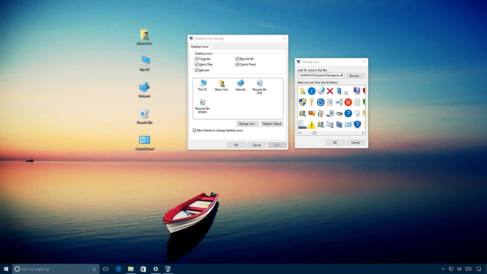 水面上的紅白船隻，Windows桌面設定已開啟。