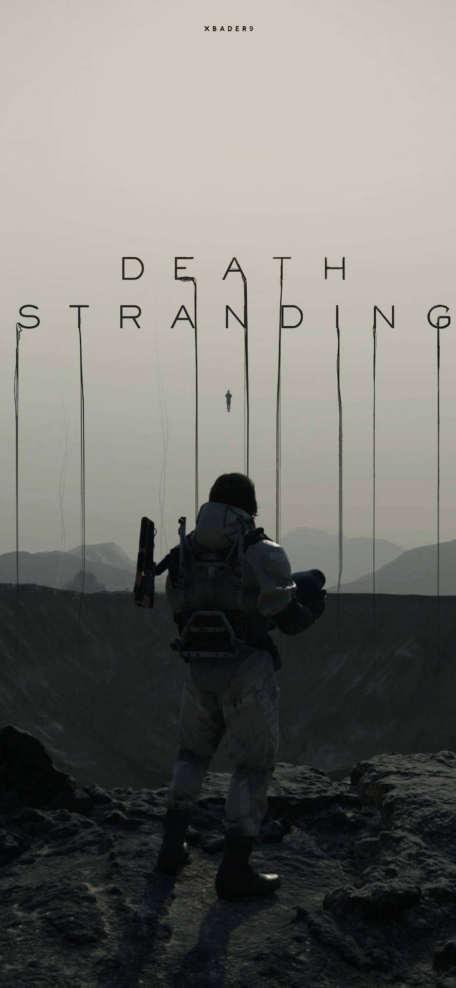 一名士兵站在懸崖上俯瞰山脈，上方漂浮著遊戲標題《Death Stranding》。
