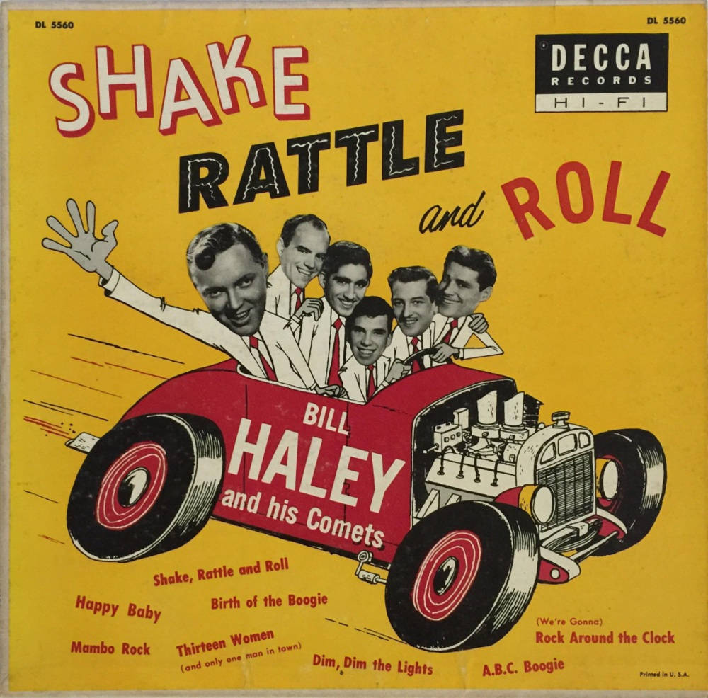 Bill Haley and his Comets 在黃色專輯封面上的紅色熱棒車上。