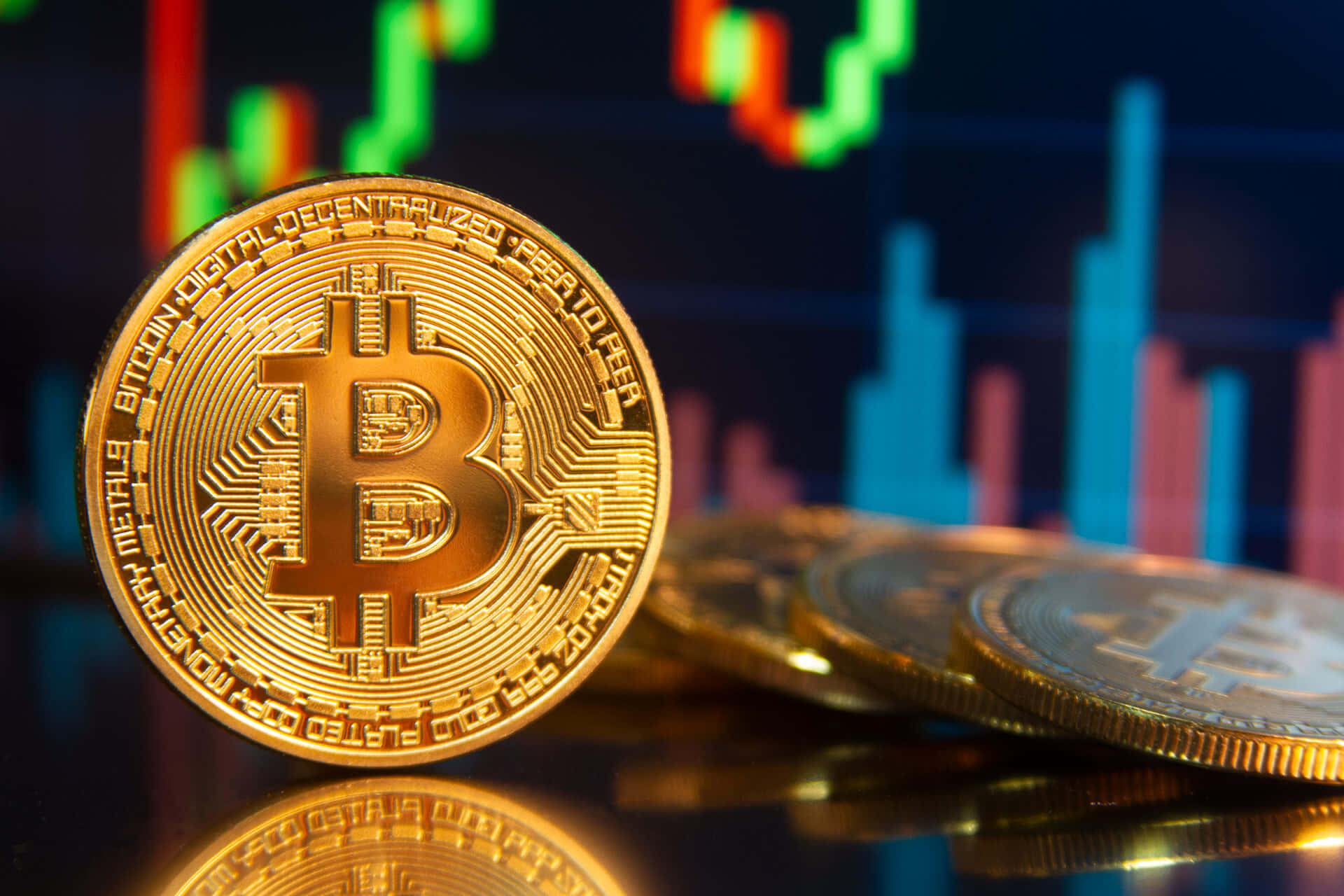 金色比特幣硬幣與背景金融圖表 — 比特幣 壁紙
