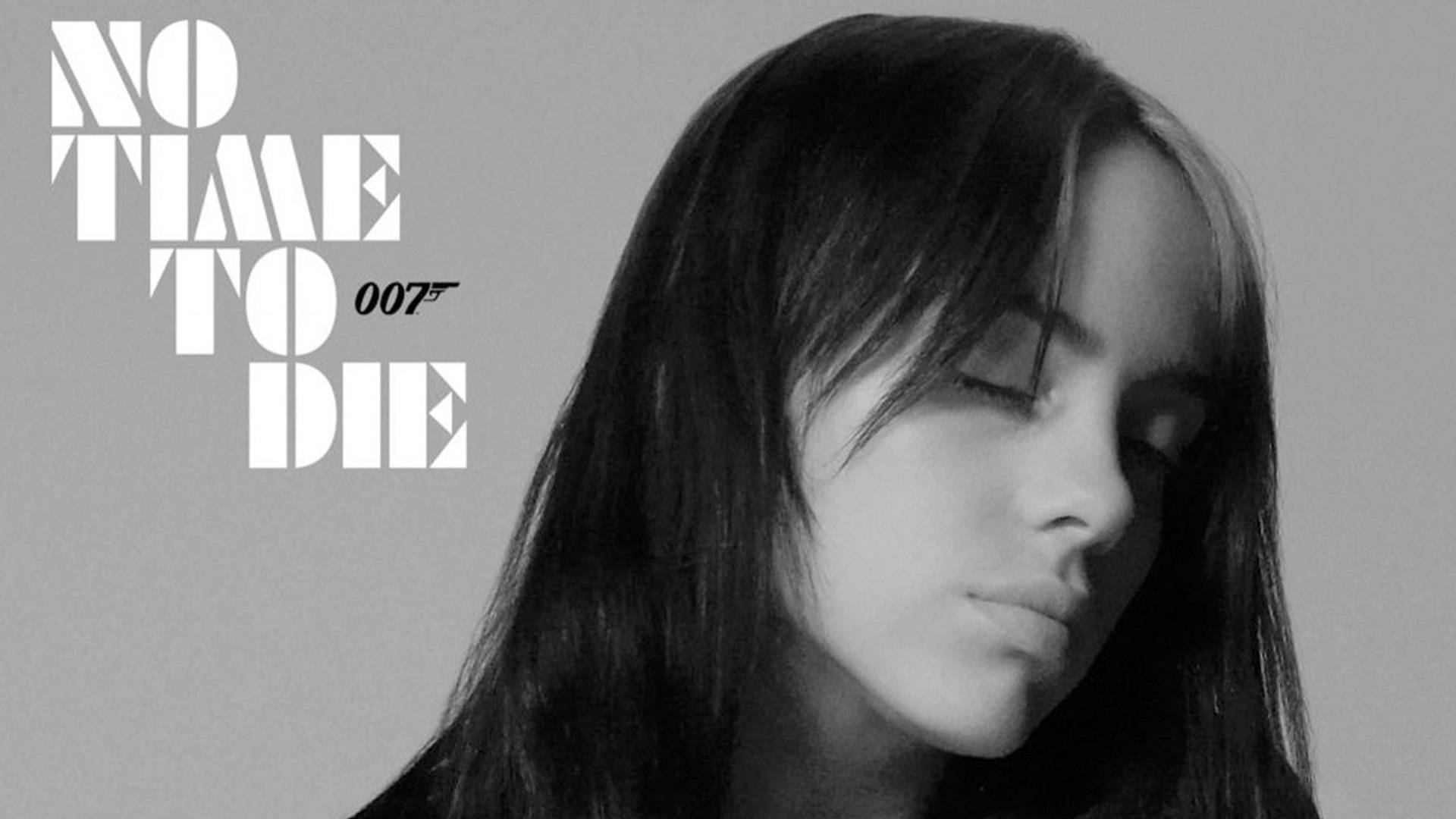 Billie Eilish 閉上眼睛，旁邊是「No Time to Die 007」文字。