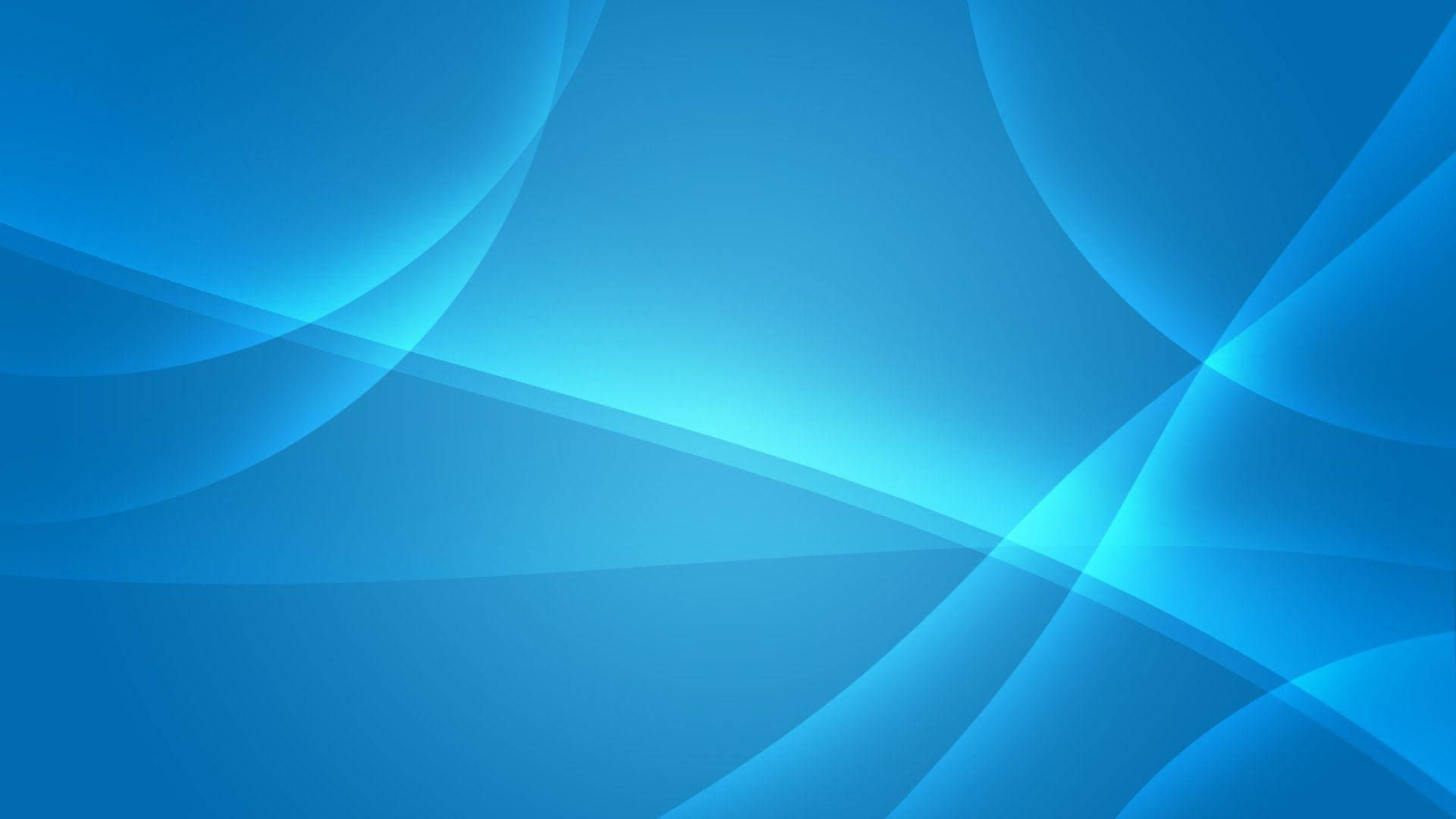 氣泡 Windows Vista 壁紙 — 柔軟流動的藍色波浪，配合漸變燈光，營造出寧靜的抽象背景。