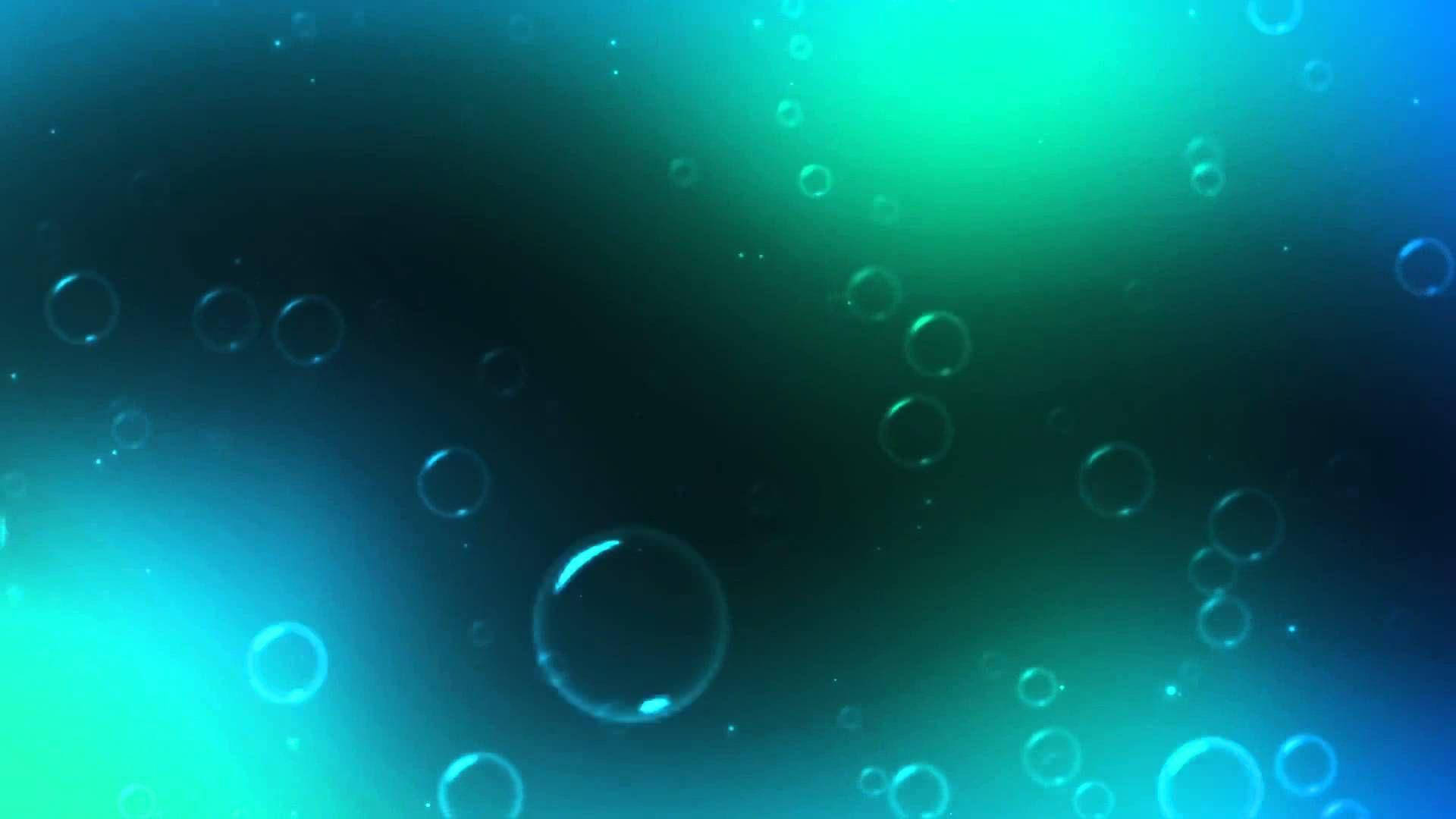 氣泡背景圖形 壁紙 — 浮動的半透明氣泡穿過藍綠色和深藍色水下光線的漸變。