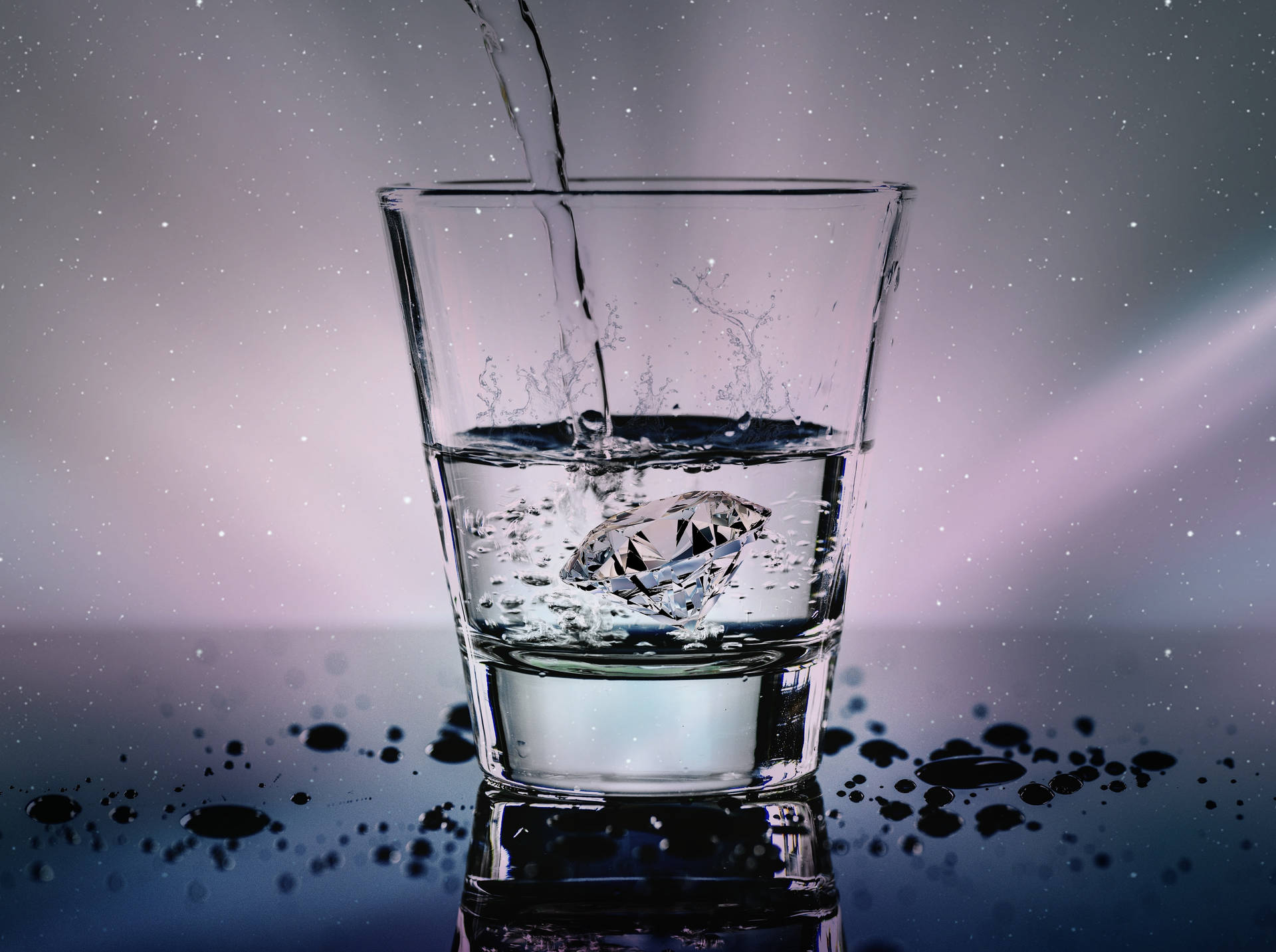 鑽石浸沒在水中，液體倒入玻璃杯，背景為繁星點點的紫色。