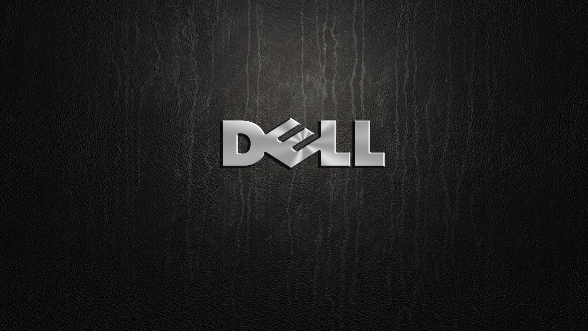 閃亮銀色 Dell 標誌在黑色皮革紋理背景上。