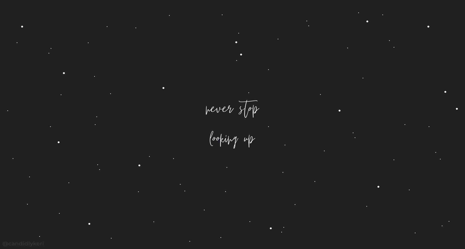 黑暗星空，白色文字寫著 never stop looking up