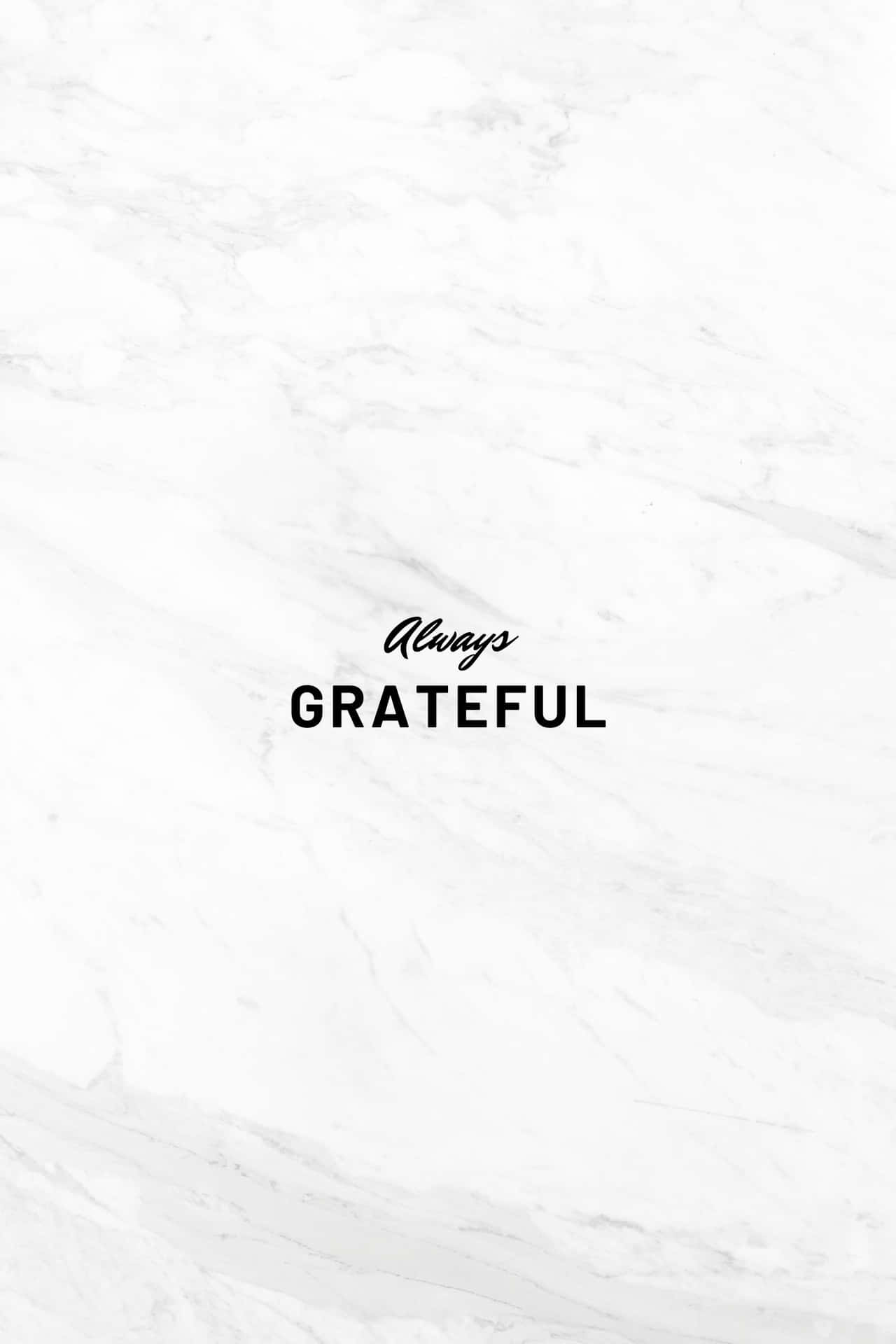 白色大理石背景，黑色文字寫著「Always GRATEFUL」