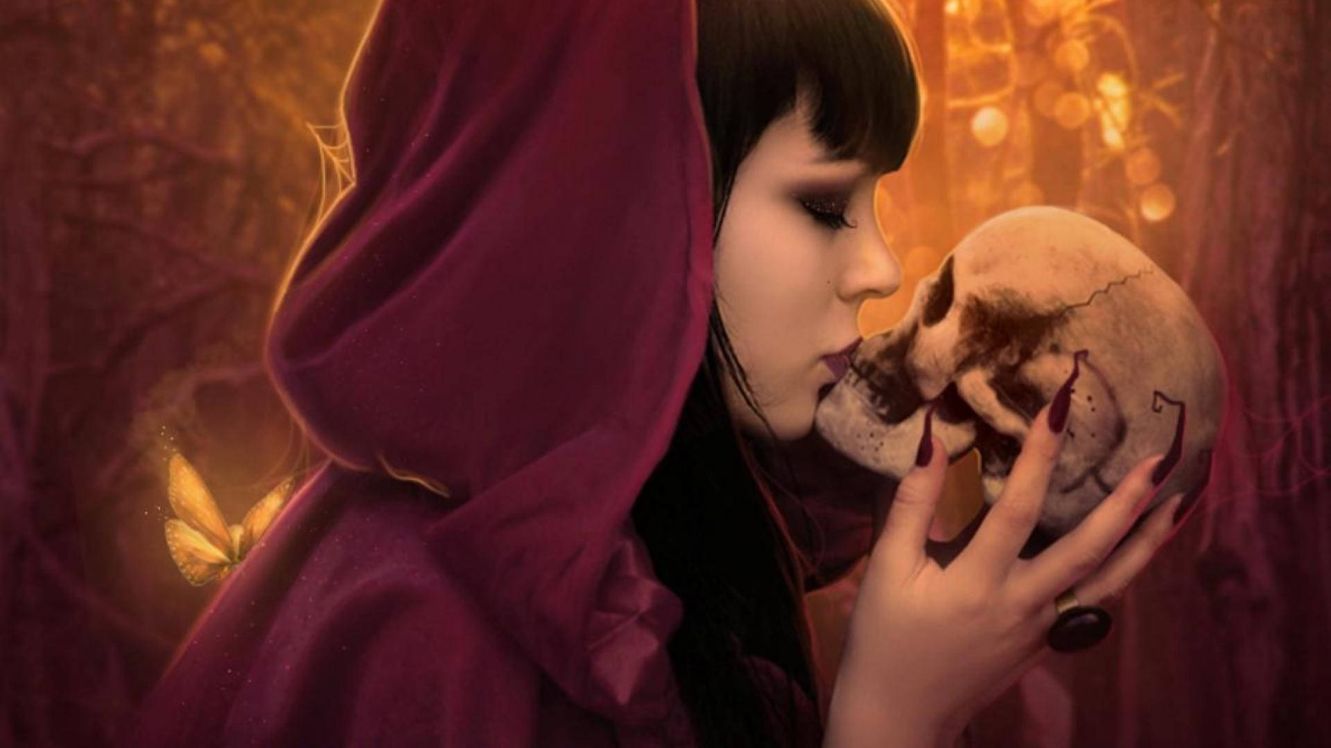 紅衣女子在閃爍光芒的魔法森林中親吻頭骨。