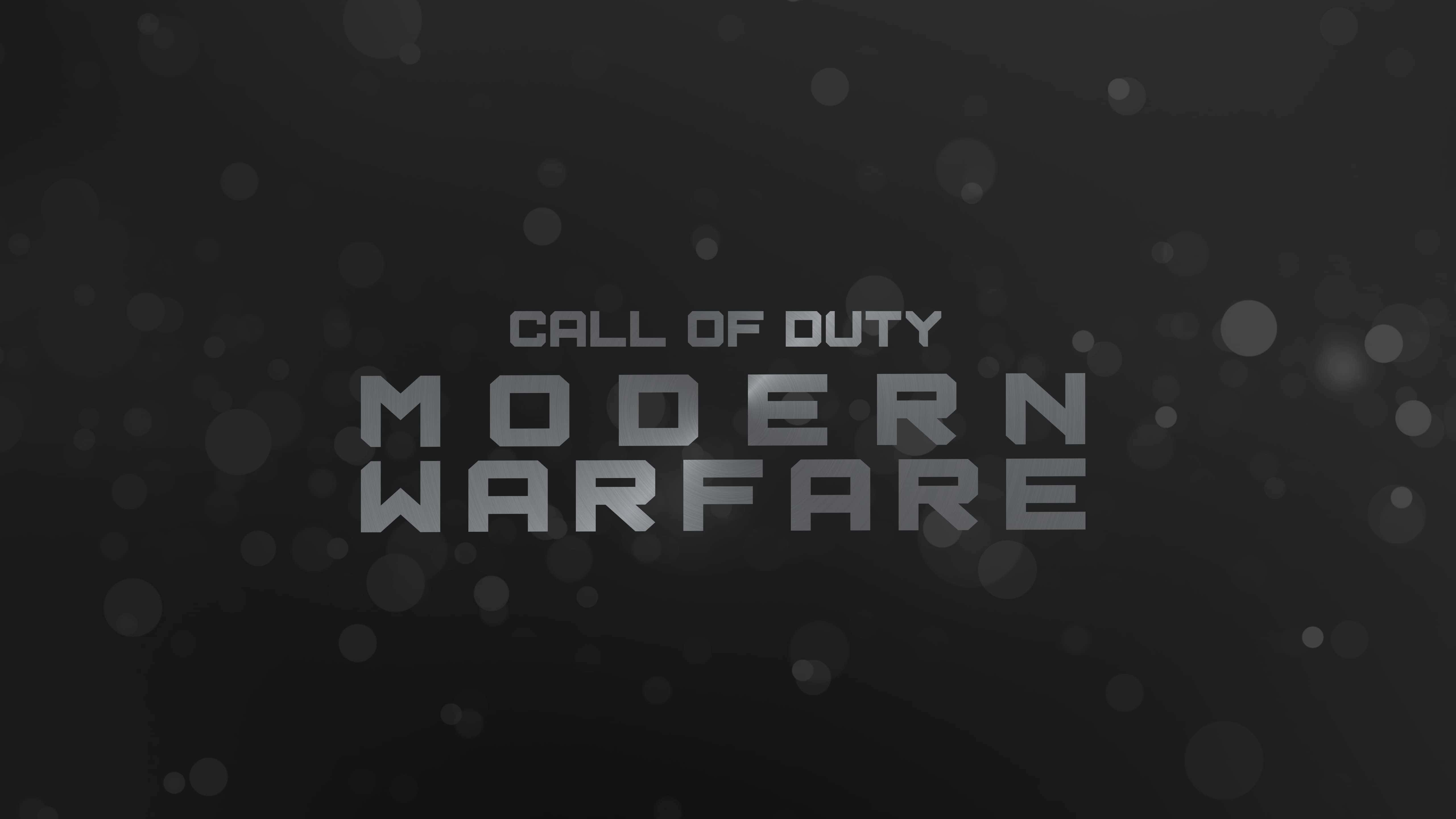 《決勝時刻：現代戰爭》——準備好行動！ 壁紙 — Call of Duty Modern Warfare 標題標誌，採用金屬銀色文字，深灰色背景帶柔和散景效果。