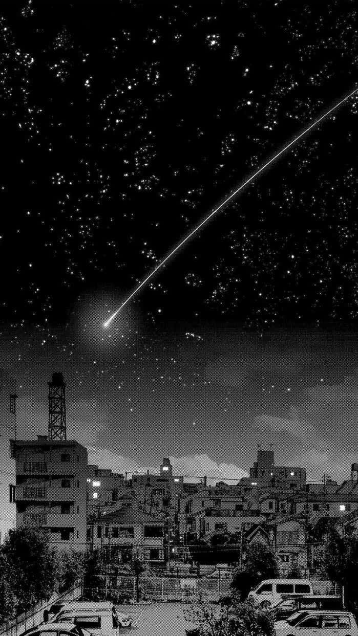 流星在星空下劃過夜晚的城市景觀。