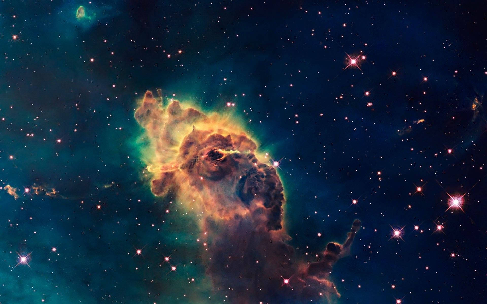 一個色彩繽紛的星雲，在深空中散發著發光的氣體和星星。