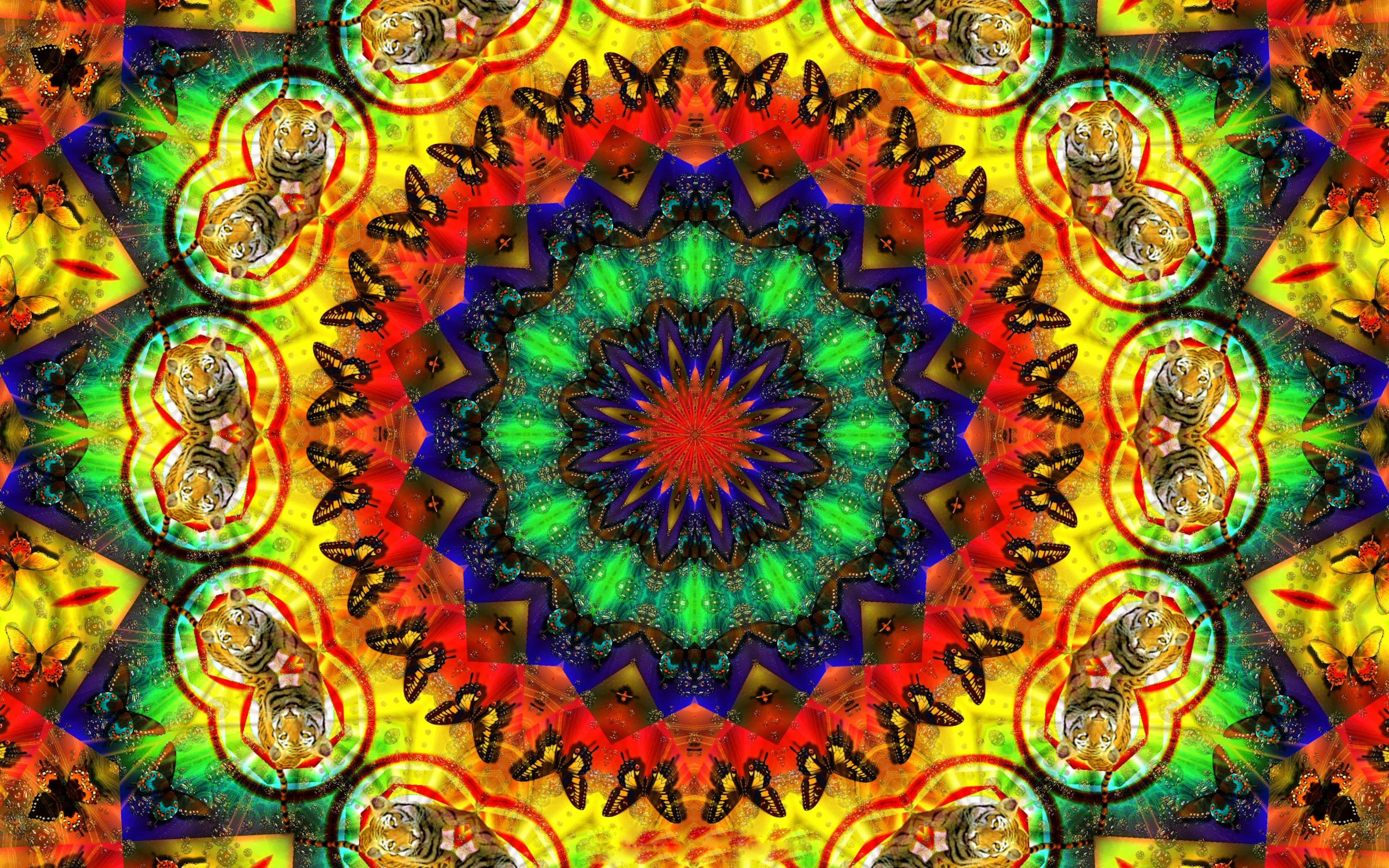 沉醉於這些迷幻圖形的美麗之中 壁紙 — 充滿活力的萬花筒曼陀羅，重複的老虎頭和蝴蝶呈現電光彩虹色調。