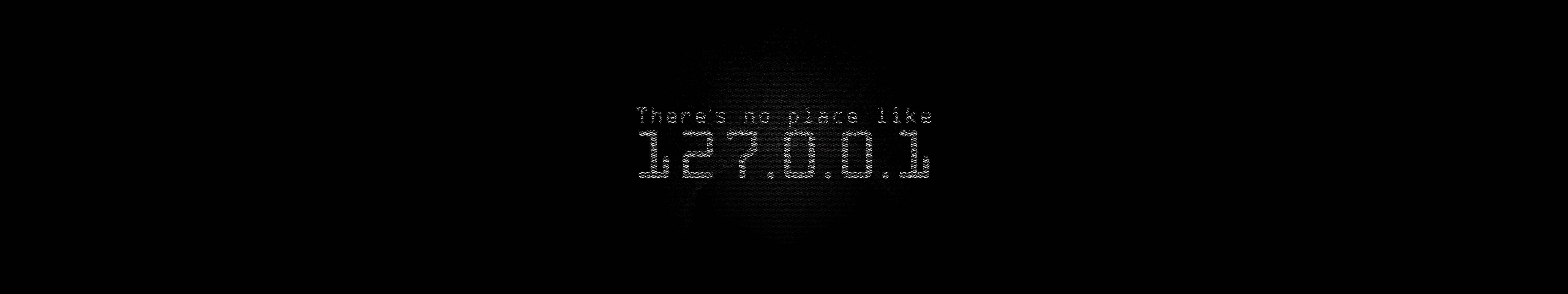 黑色背景上發光的數位文字顯示「There's no place like 127.0.1」