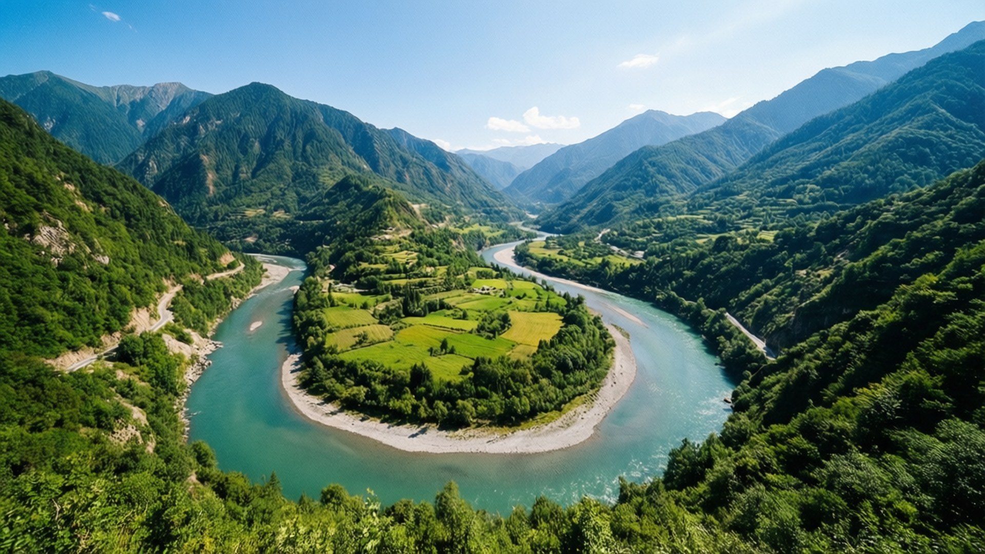 河谷壯麗風景 壁紙 — 一條蜿蜒的碧綠河流優雅地穿過鬱蔥的綠色山谷，兩旁是高聳的森林覆蓋的山脈，在清澈的藍天下。