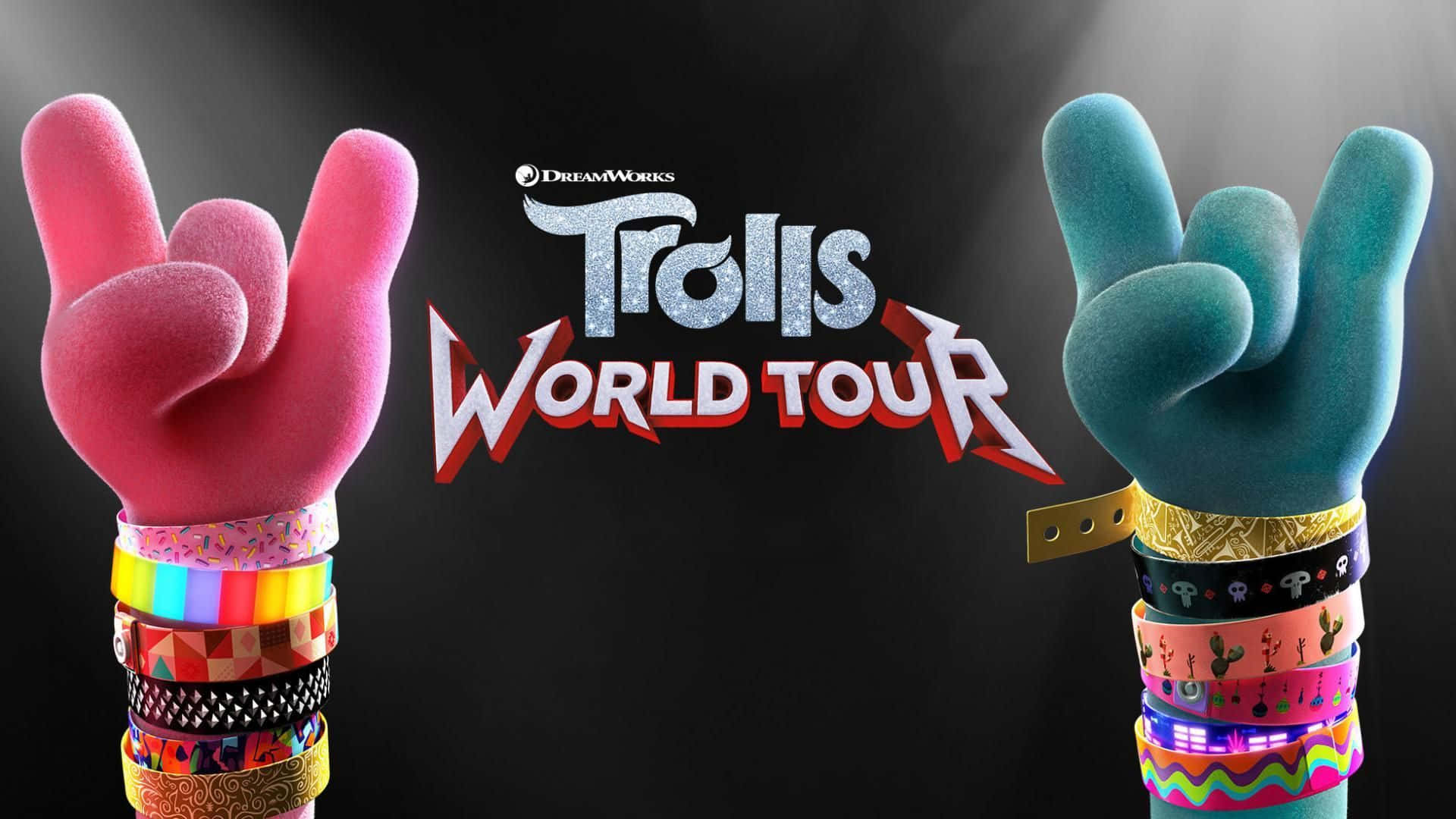兩隻卡通手做出搖滾手勢，戴著彩色手環和 Trolls World Tour 標誌。