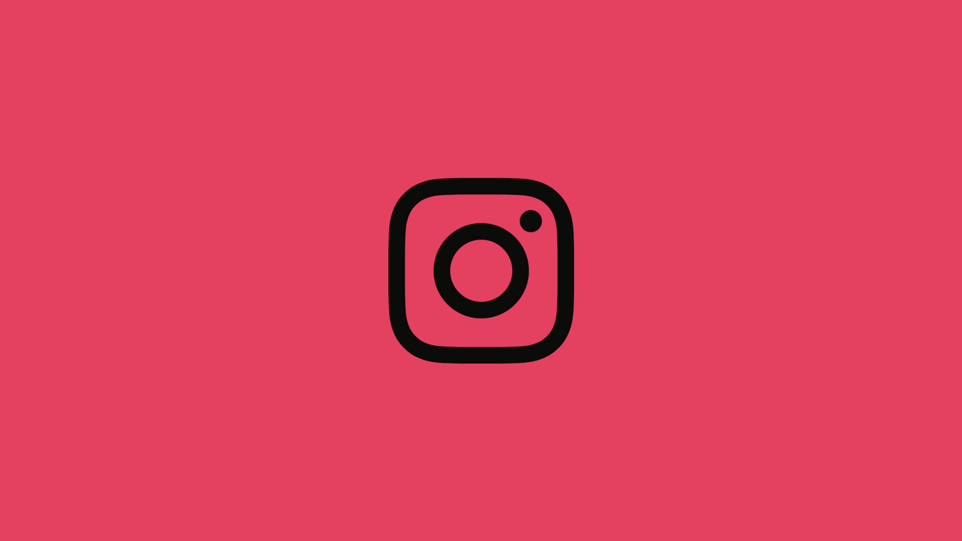 Instagram標誌圖標在粉紅背景上