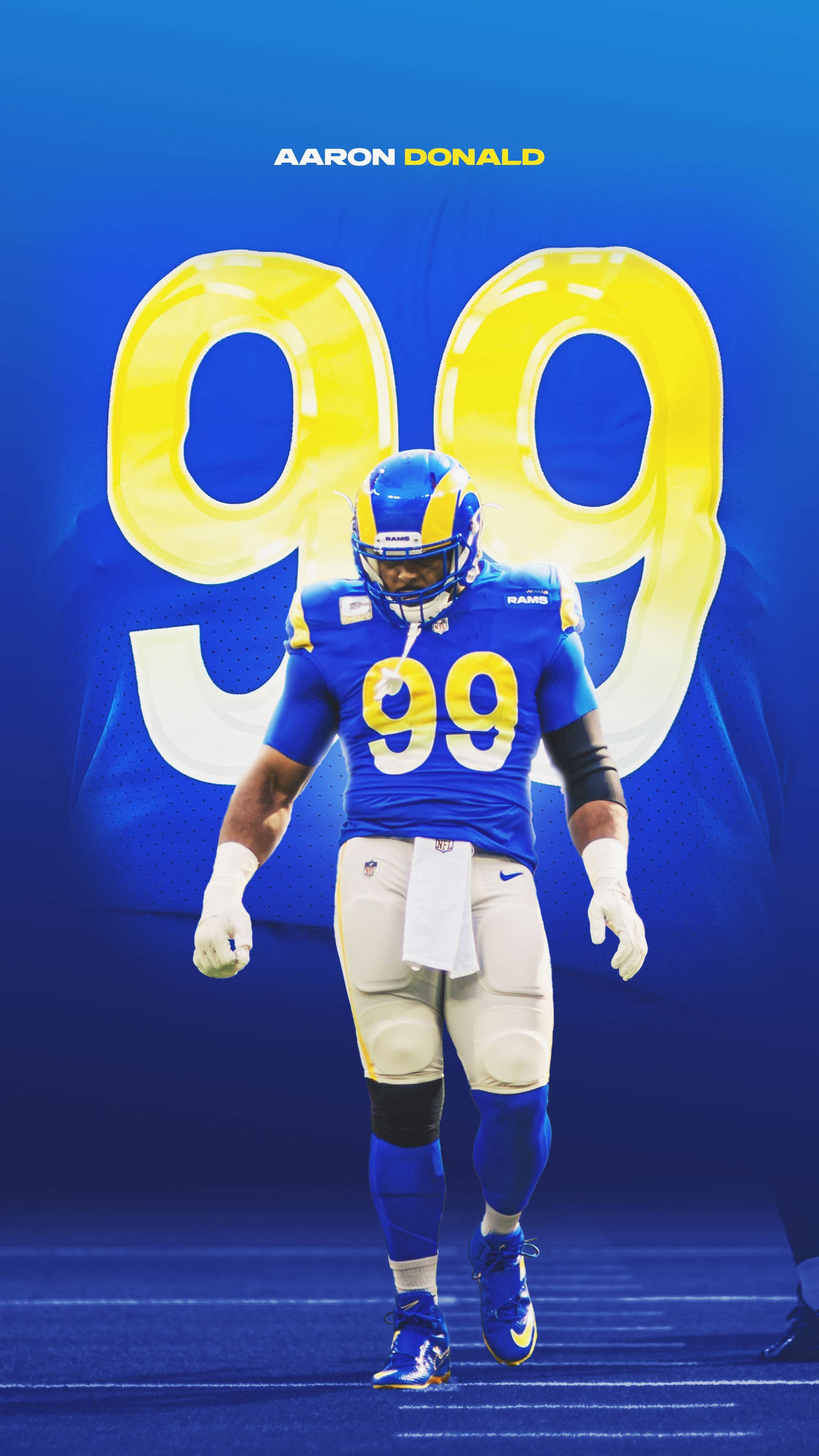 洛杉磯公羊隊阿隆·唐納德99號球衣 壁紙 — Aaron Donald 身穿藍色公羊隊球衣向前走，背後發光的99號在鮮豔的藍色背景襯托下。