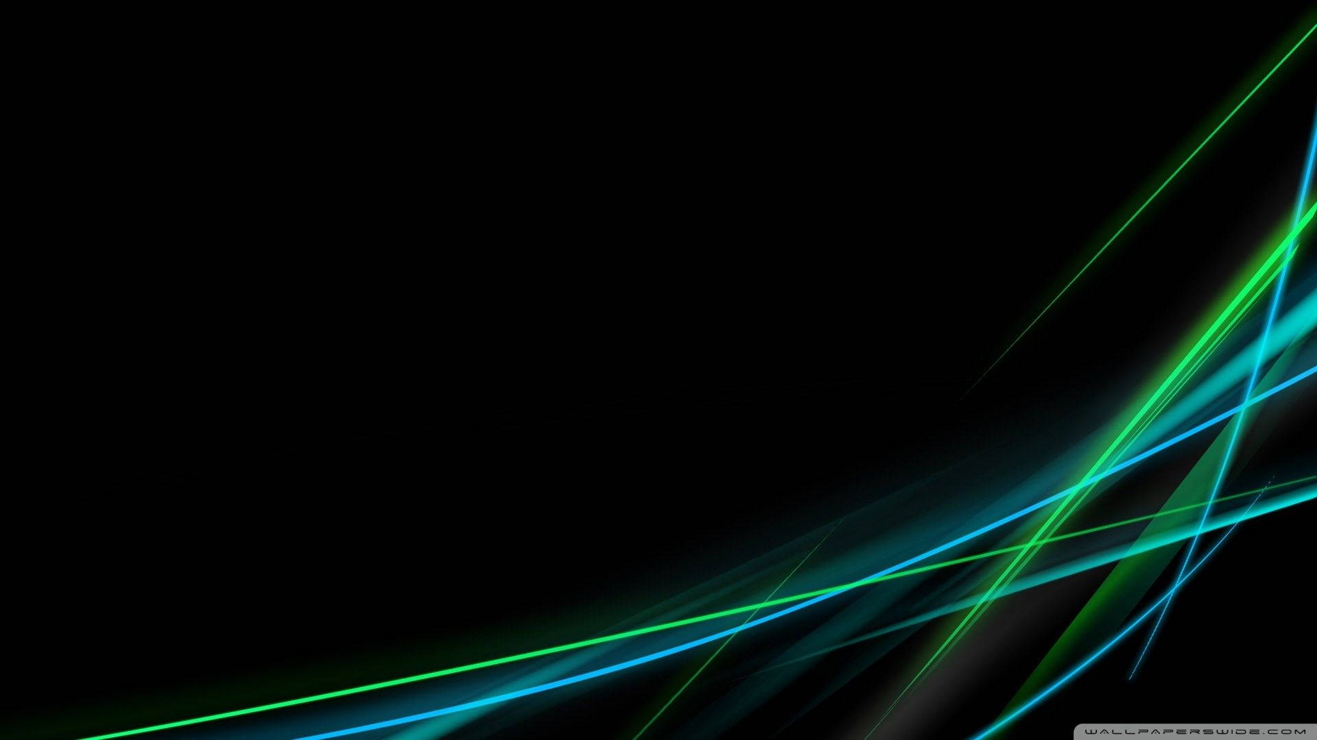 流動線條 Windows Vista 壁紙 — 充滿活力的霓虹綠和藍色光線條在深黑色背景上對角流動，創造出動態的數位抽象。