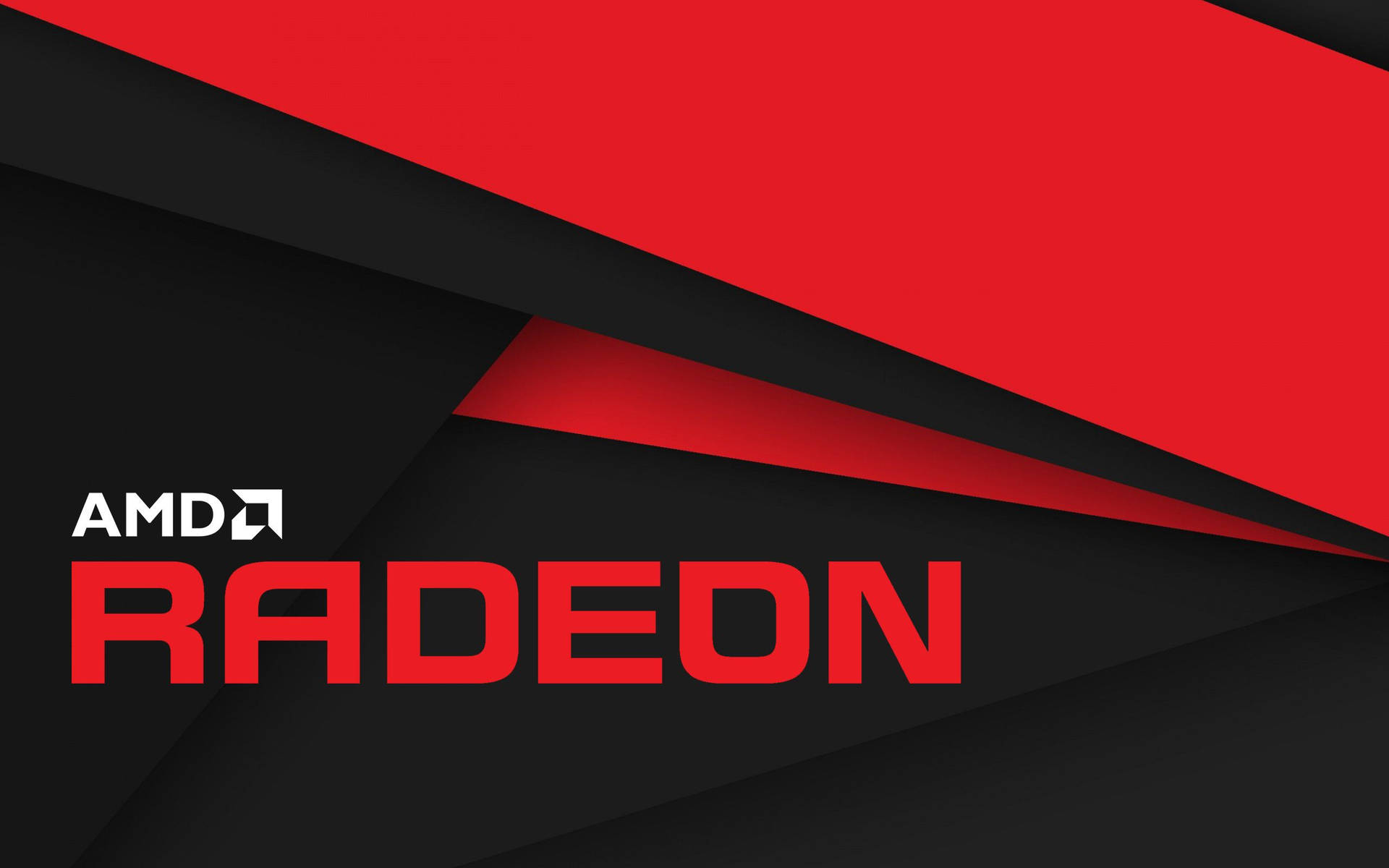 紅色和黑色幾何背景上的 AMD Radeon 標誌